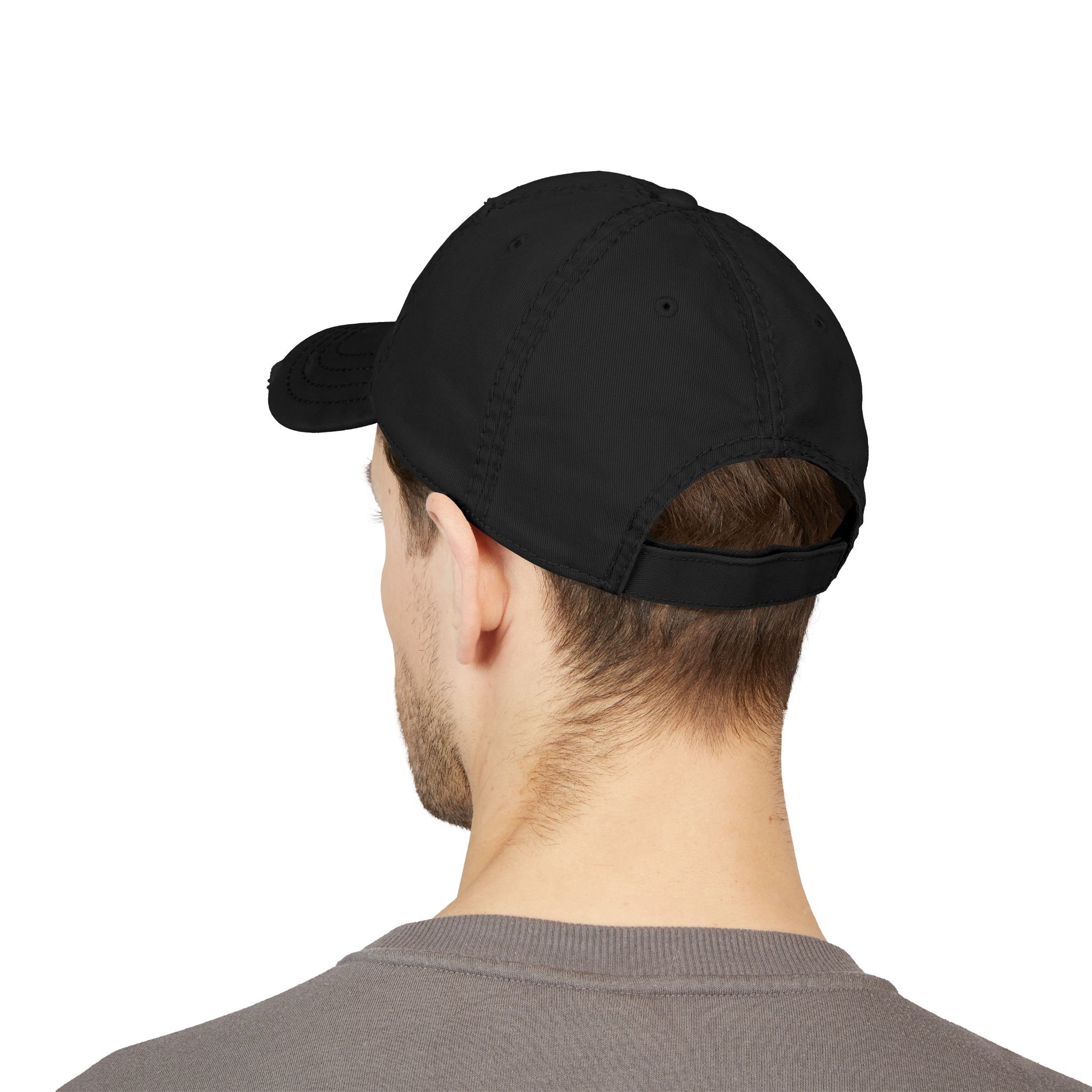Lifestyle side view of person wearing distressed dad hat with embroidered “Start the Work. Keep Moving. Finish Strong.” message
