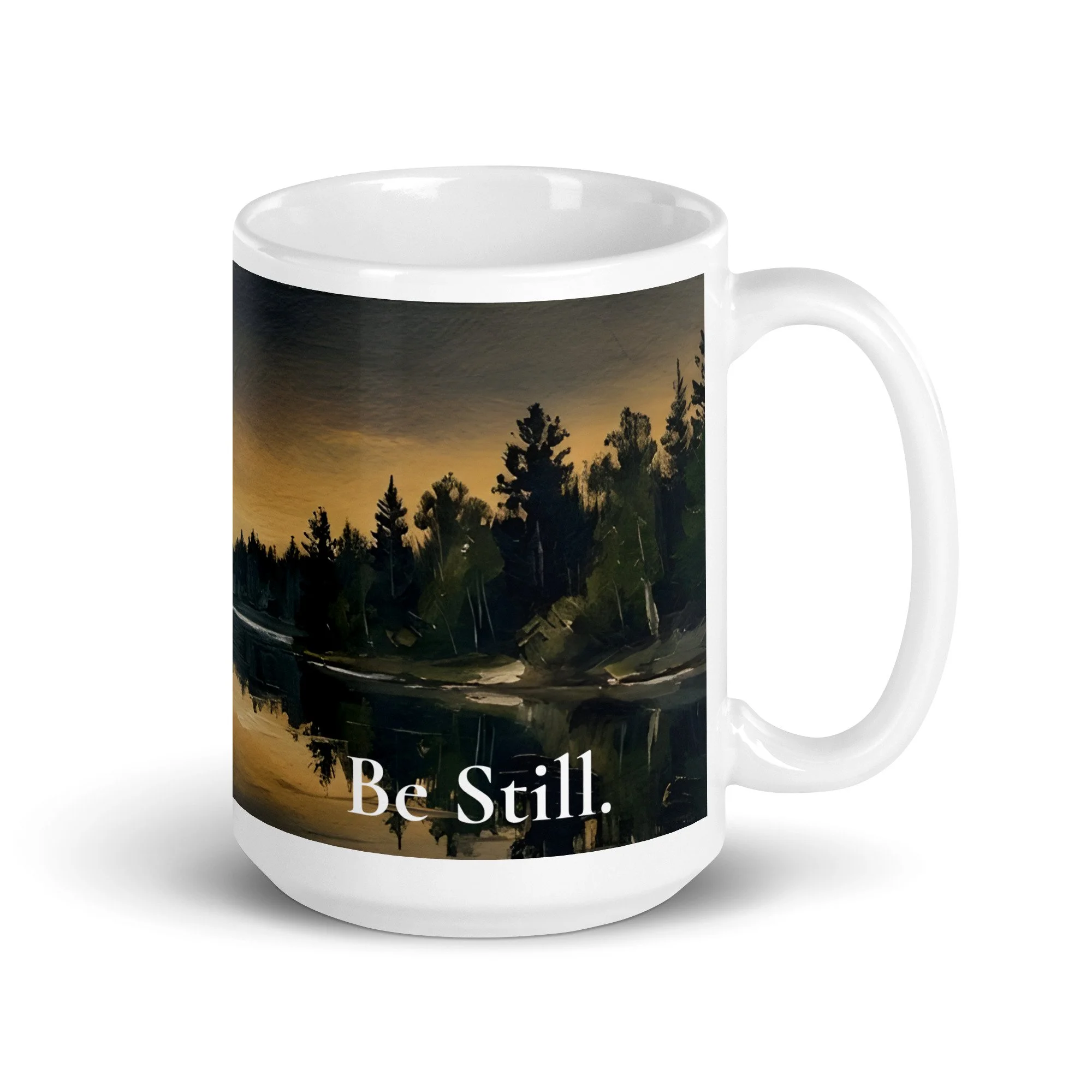Close-up of the "Be Still" design printed on a white 15 oz. ceramic mug.