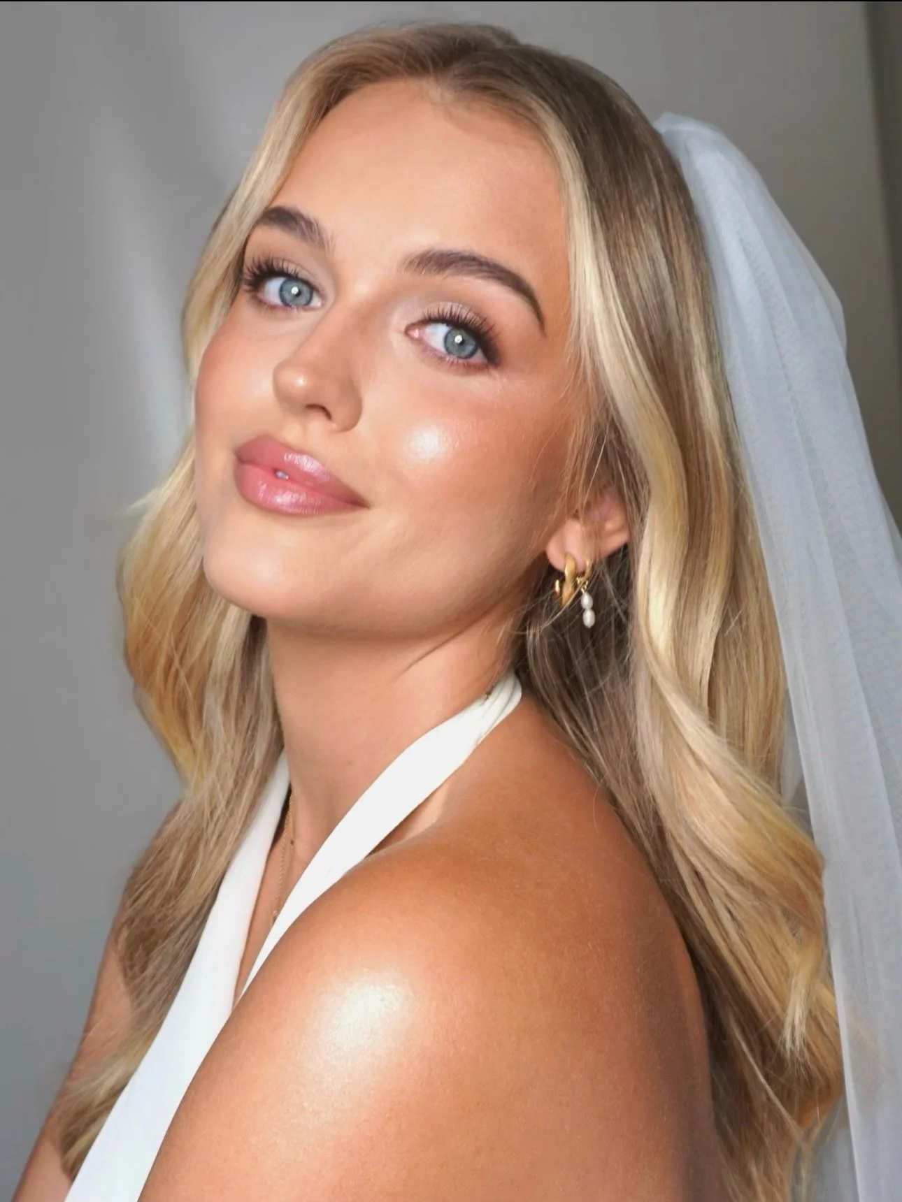 My proposal for my signature bridal makeup look for 2027 💁🏻&zwj;♀️🤍 created on stunning @tara.smith26 

Defined eyes with a touch of subtle shimmer, and elongated fishtail individual lashes, my fav 🤭

Enough bronzer and sculpting to give dimensio