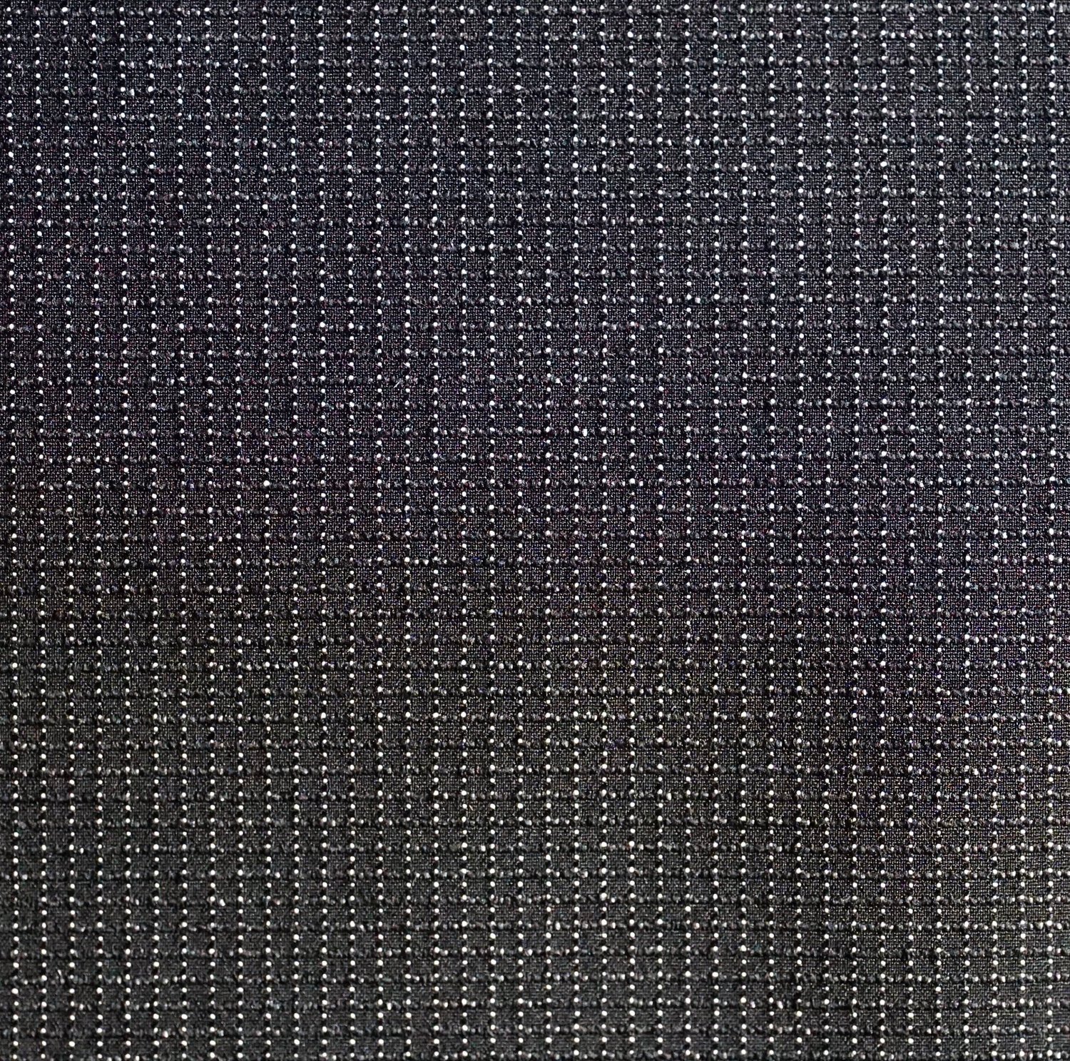 Tissu noir avec de petites perles blanches zébré