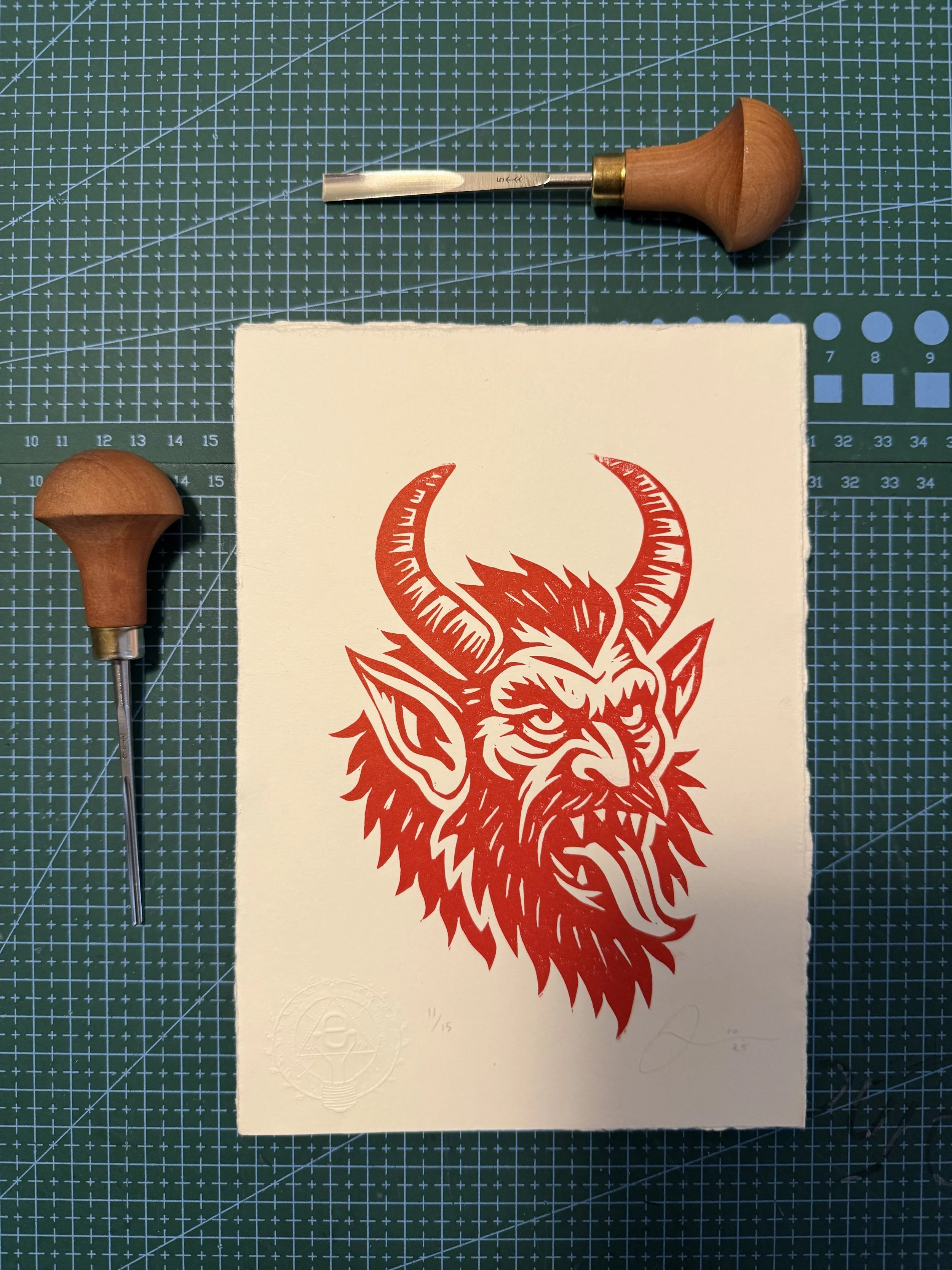 Limited-edition red linocut print of Krampus by Elucidation Inc. Hand-carved and hand-printed on cotton paper, signed, numbered, and embossed. Edition of 15.