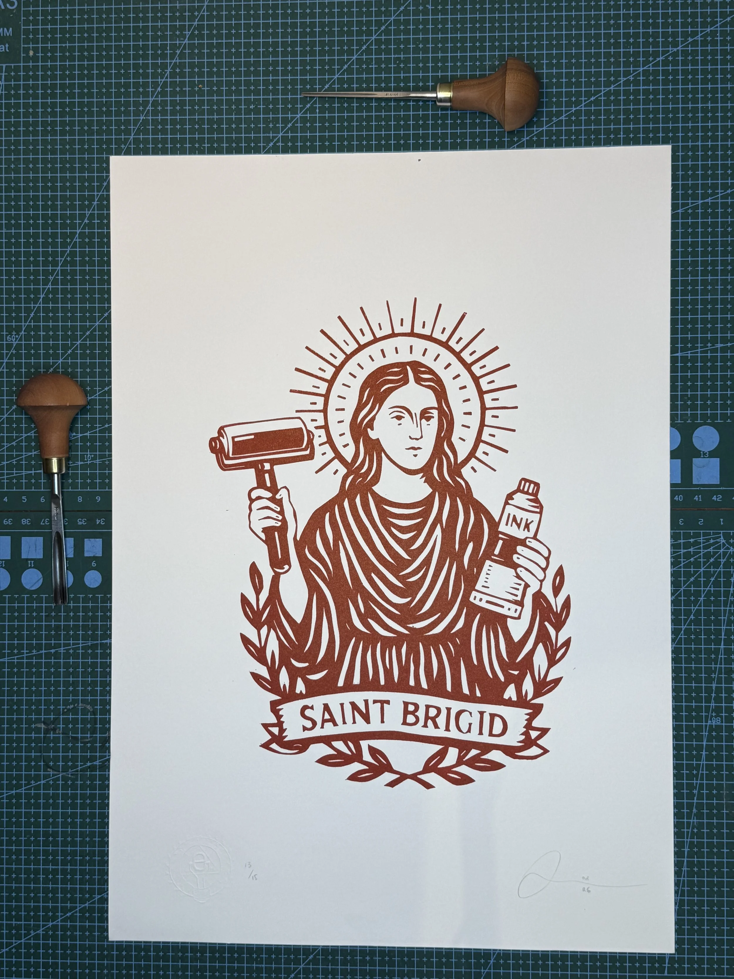 Saint Brigid patron saint of printmakers linocut print holding brayer and ink