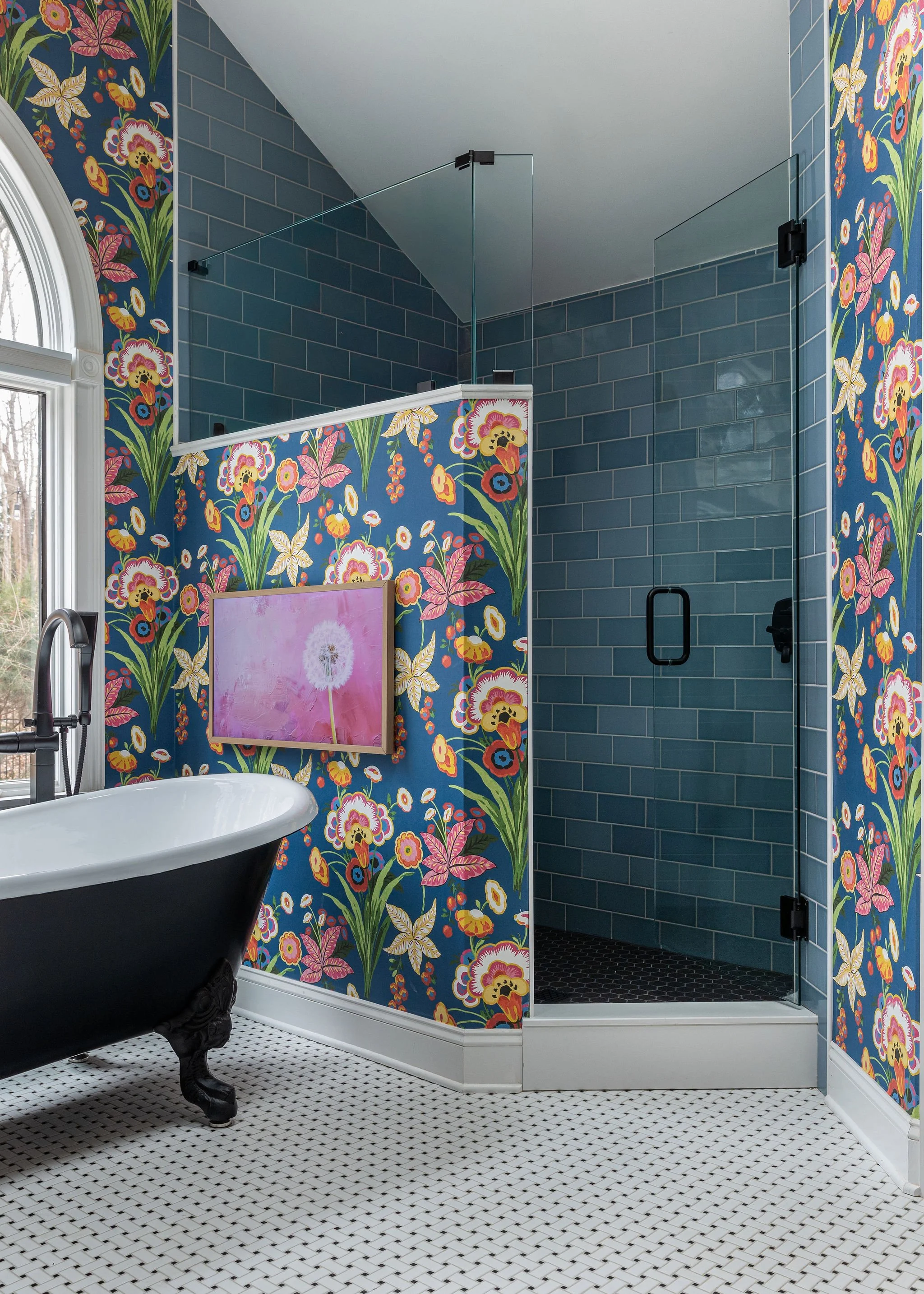 Transformed master bathroom with modern shower wall, custom storage, and vibrant design in Timberland, NC. 