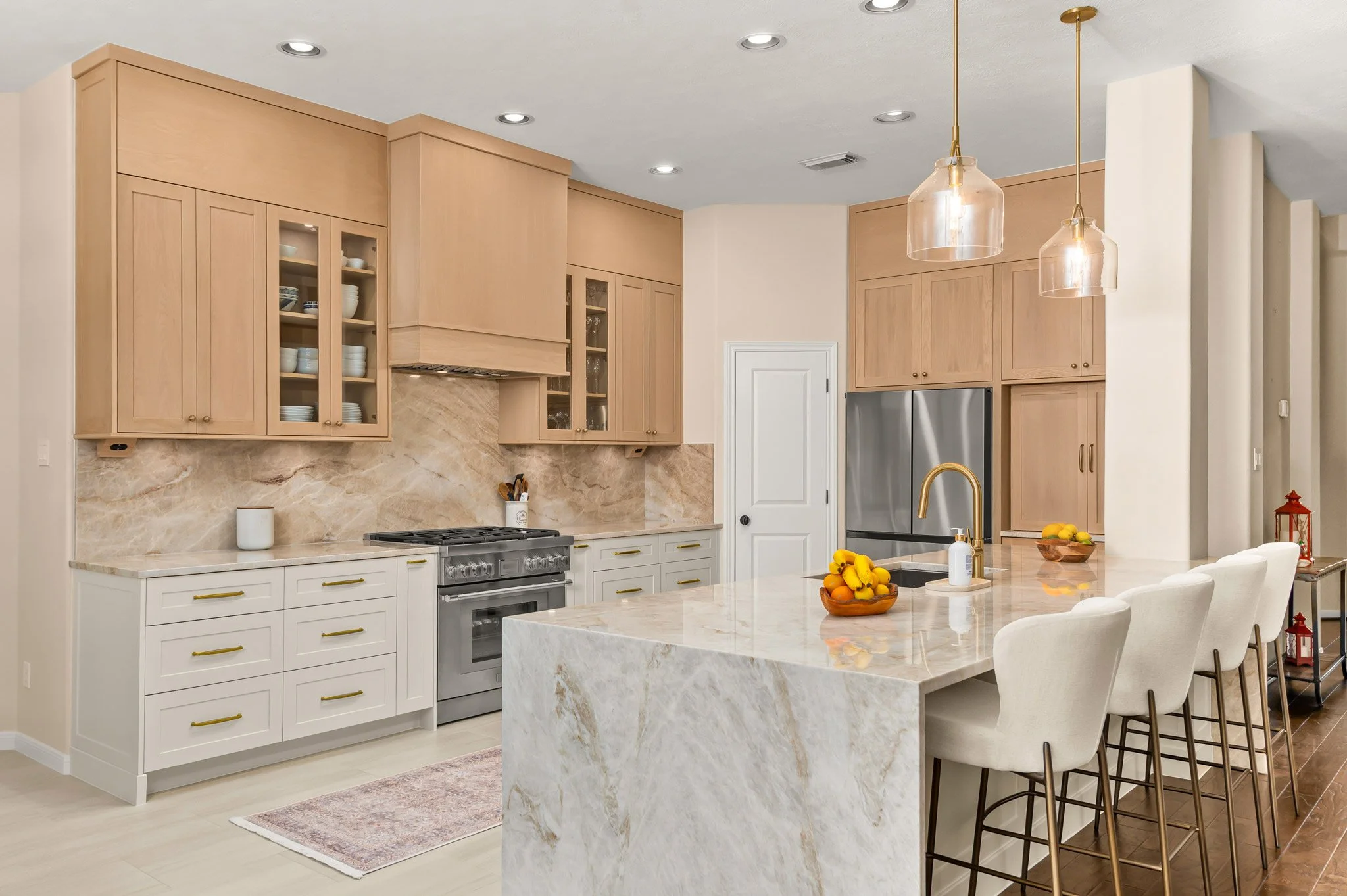 A beautiful and bright kitchen, welcoming space where thoughtful design, quality materials, and smart functionality