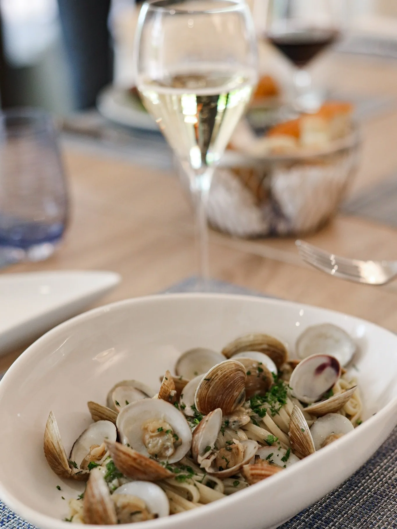 Sundays on Key Biscayne are made for slowing down and savoring the simple pleasures.
Our linguini alle vongole, with fresh clams, white wine, and parsley, is a tribute to passion, heritage, and our love for food.

Every detail matters, from the fresh