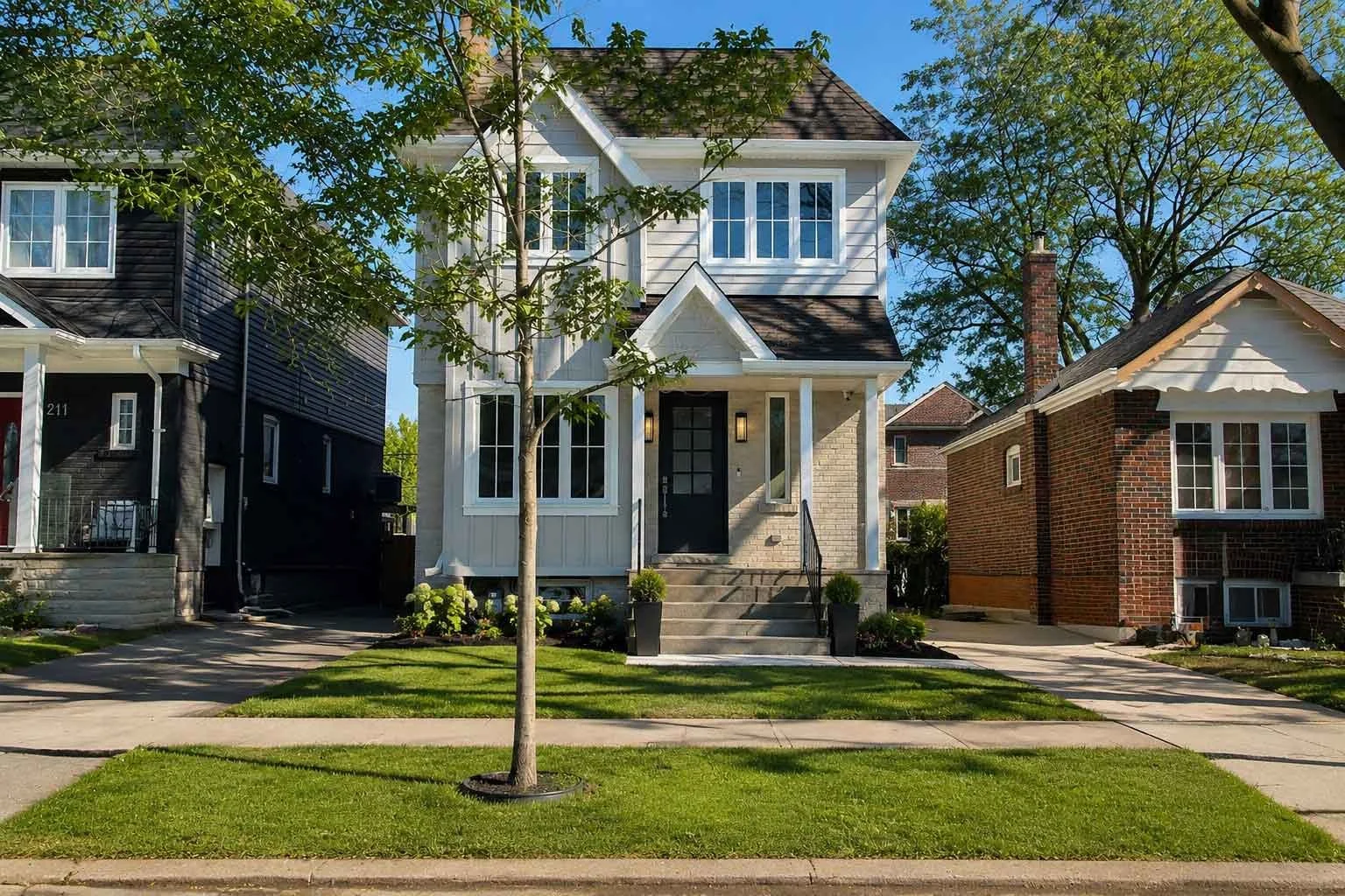 Front exterior of an Alderwood second storey addition completed by Waterfront.