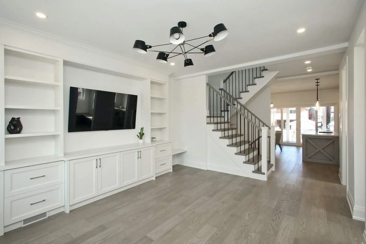 Open living and dining area with new flooring in an Alderwood second storey addition.