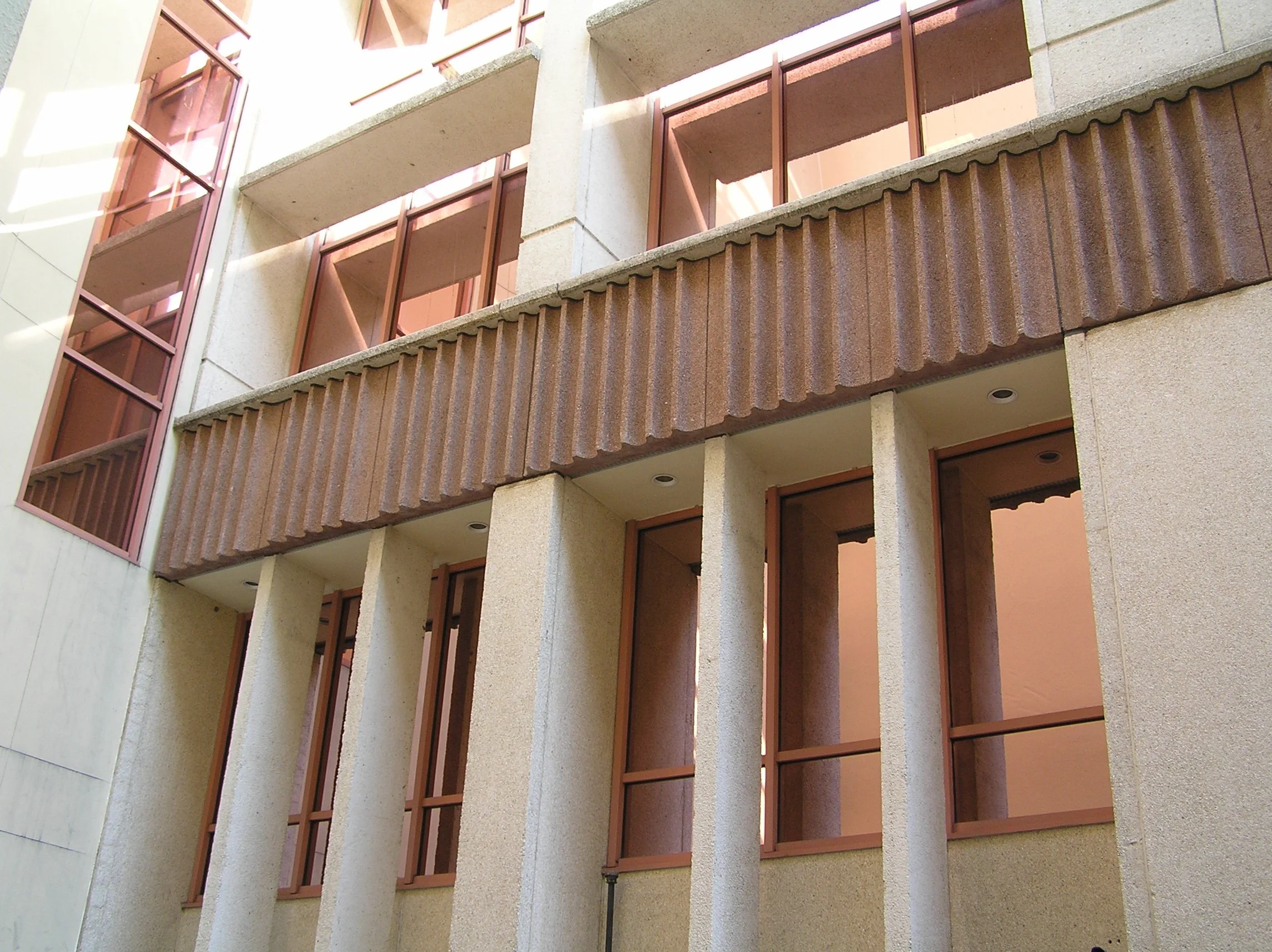 Solar and security window film on commercial building.