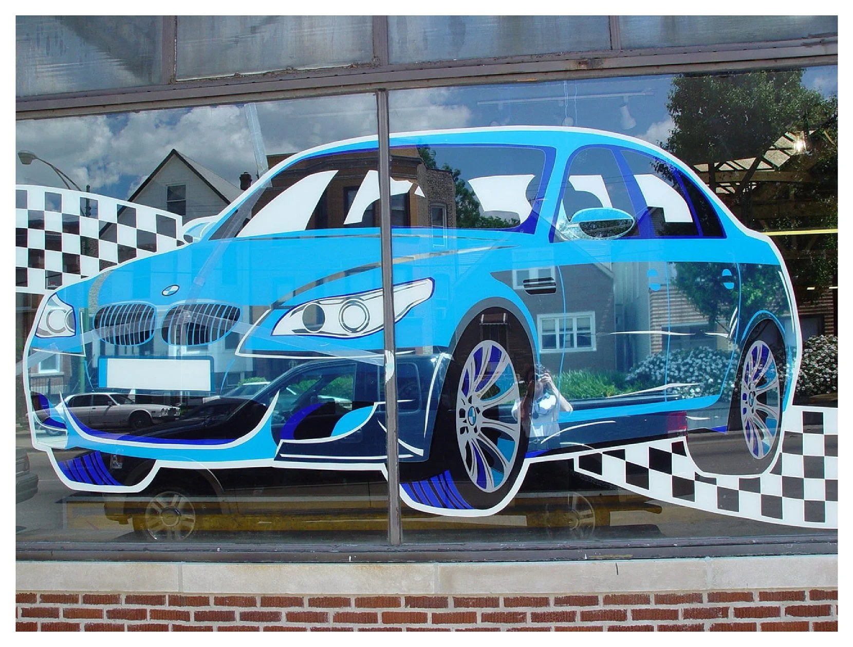 Graphic illustration of a blue car on a window with building reflections