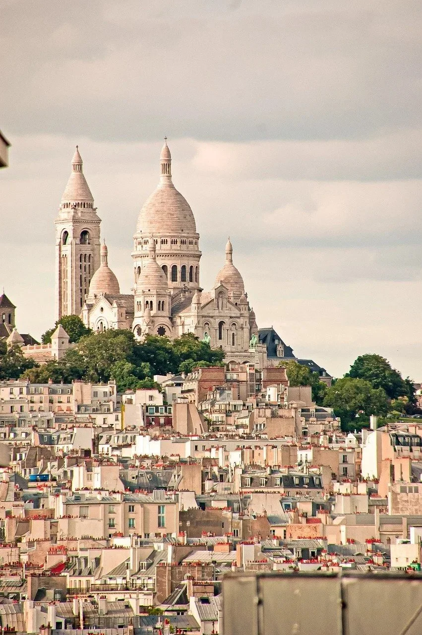 Sacré-Cœur Basilica above the rooftops of Montmartre, Paris