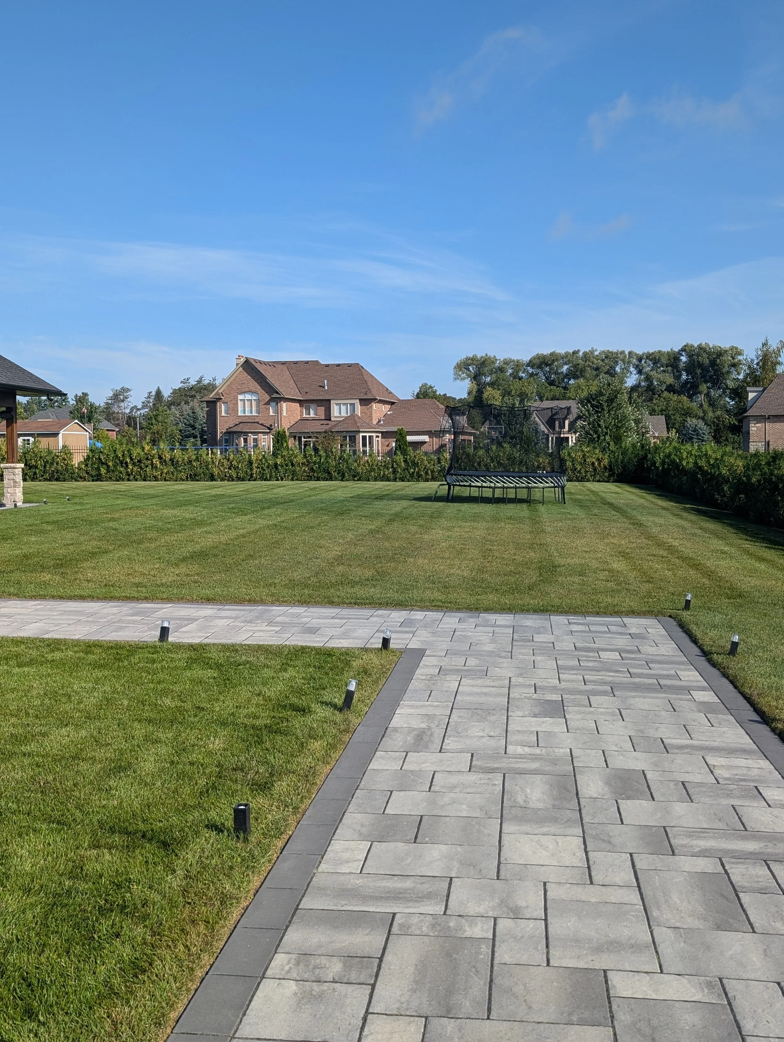 Why Moving Lawn Obstacles Creates a Better Finished Cut