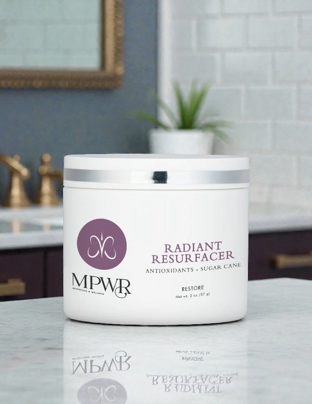 White jar of MPWR Radiant Resurfacers skincare product with a silver lid and black and white label.