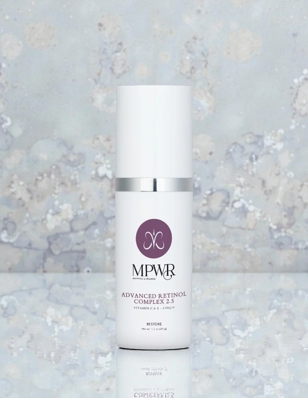 A white skincare bottle labeled MPWR Advanced Retinol Complex 2.5 with a black butterfly logo and silver accents.