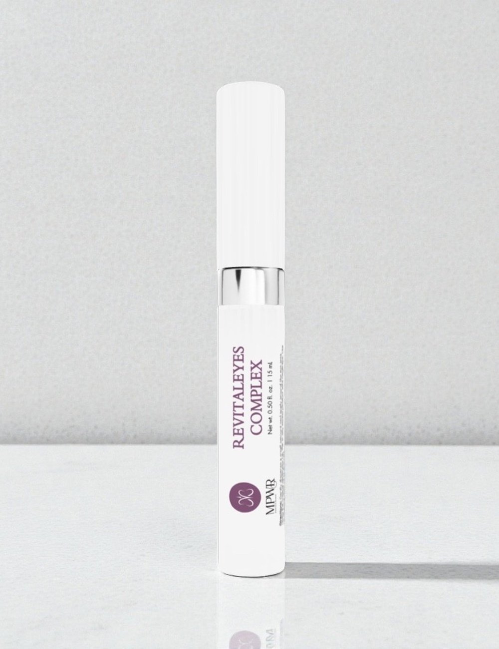 Lip balm tube labeled 'Revital Eyes Complex' by MPWR