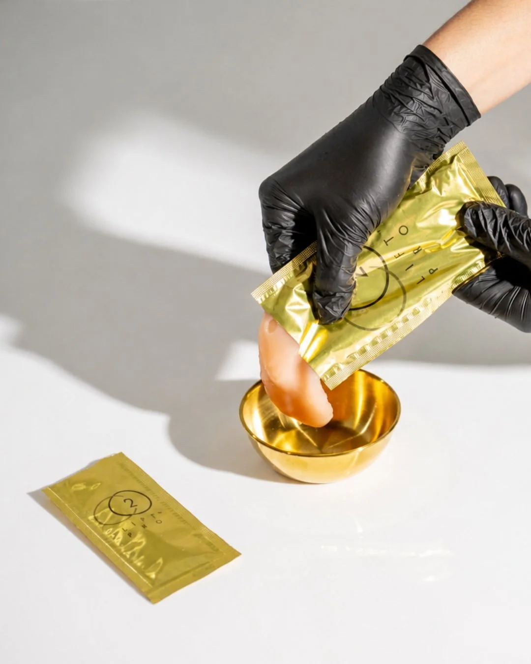 Patient applying CO2Lift Pro carboxytherapy gel for the MPWR Skin Reset Program
