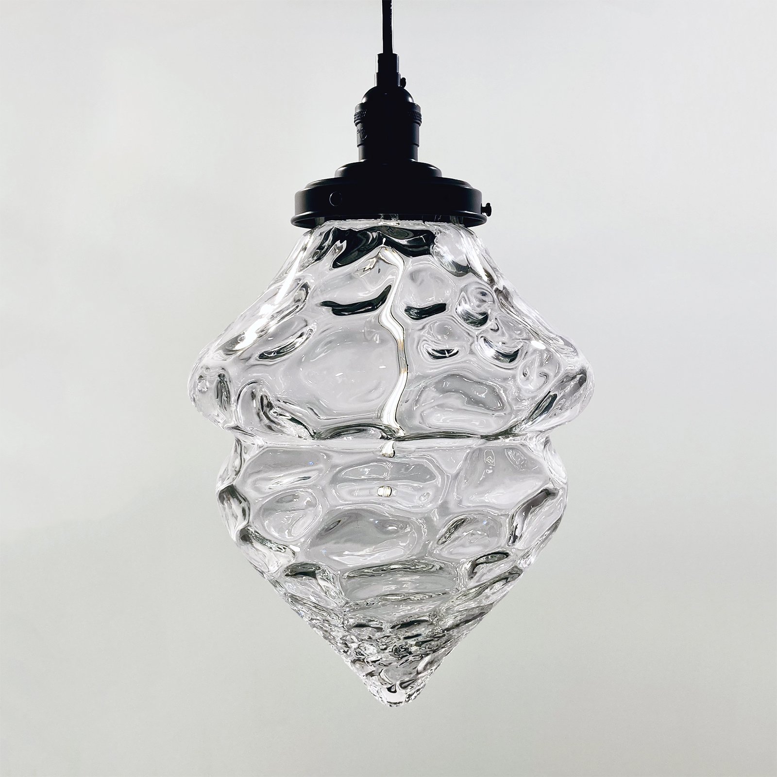 Mint Pendant Light in Clear glass with dimpled Boulder optic with Black hardware finish