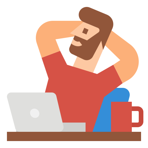 A cartoon man with a beard and red shirt sitting at a desk, smiling with hands behind his head, next to a laptop and a red coffee mug.