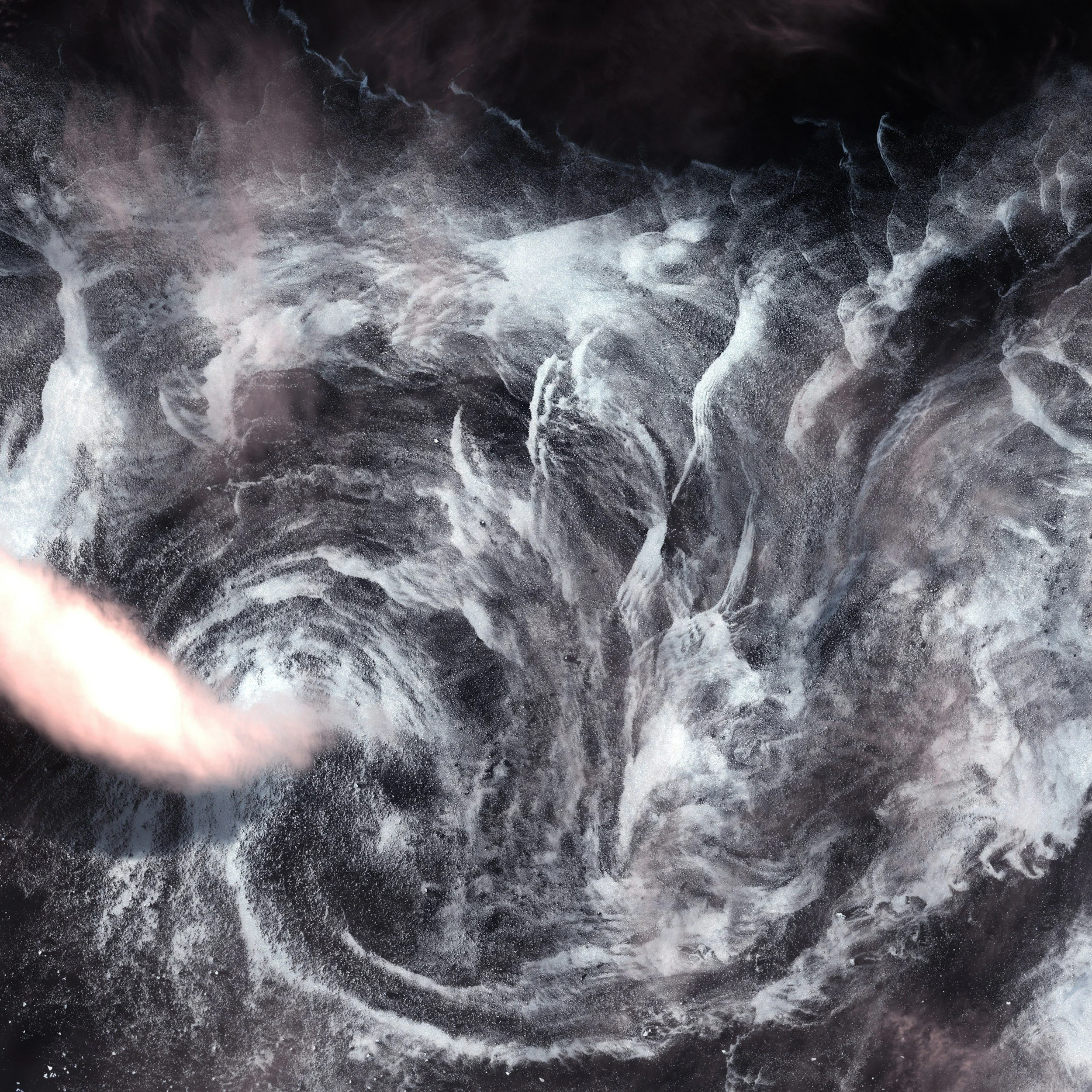 Whirlpool of swirling black and white water, creating a vortex or whirlpool.
