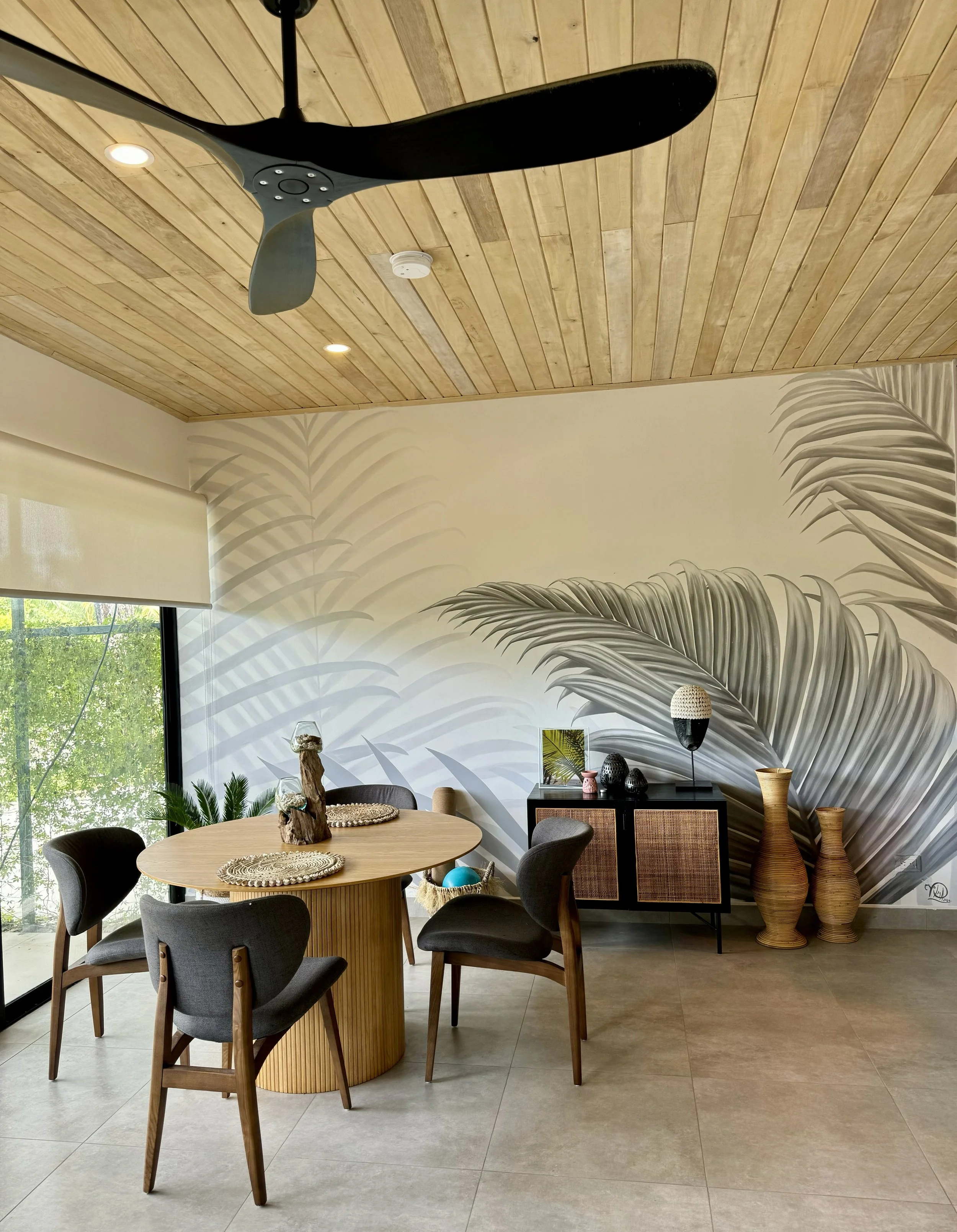 Dining space with striking mural