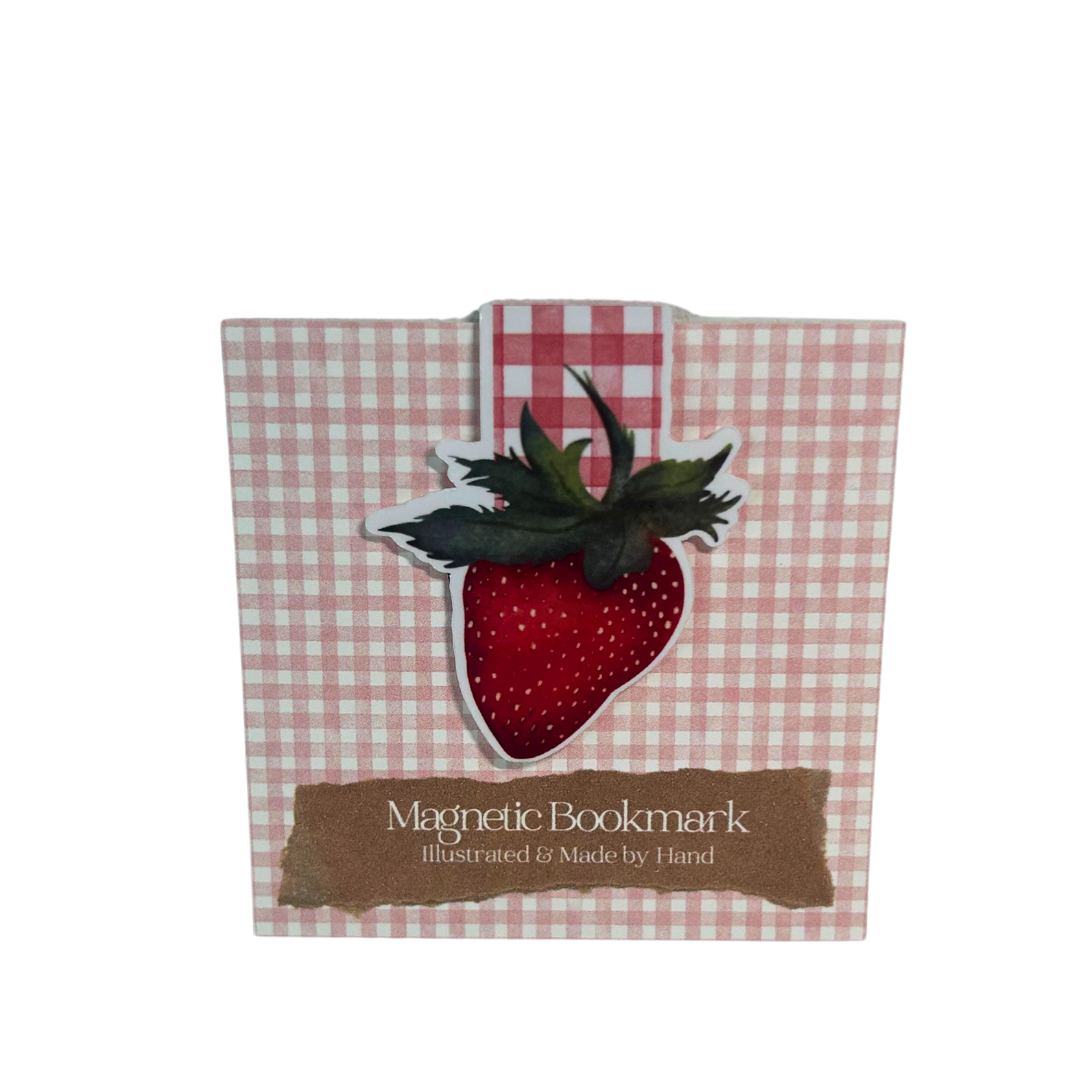 Handcrafted strawberry magnetic bookmark with hand-illustrated red strawberry and pink gingham tab from Gather’s Strawberry Summer Collection.