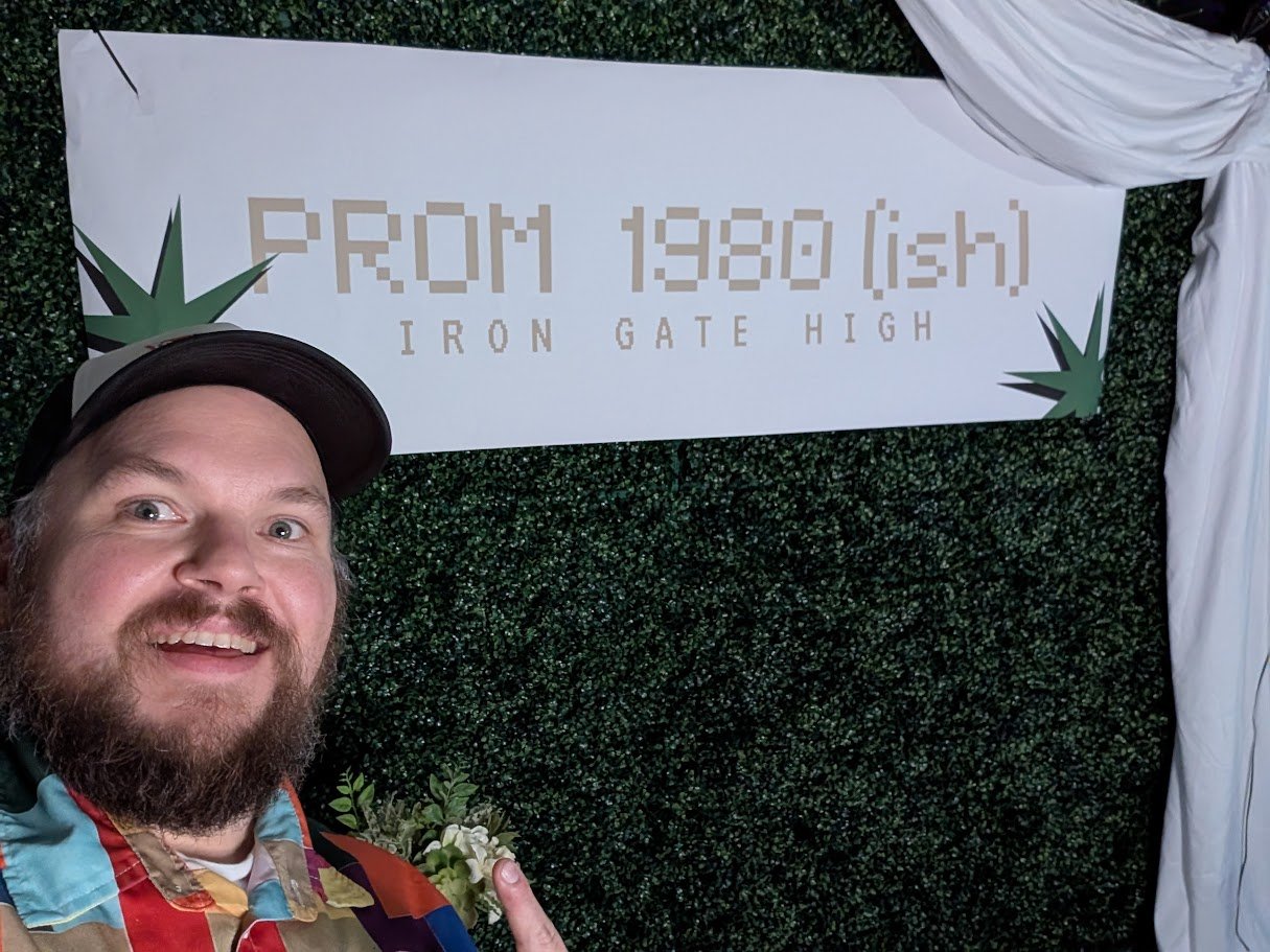 80s Prom-Themed Corporate Christmas Party DJ in Columbia, MO | Iron Gate Real Estate