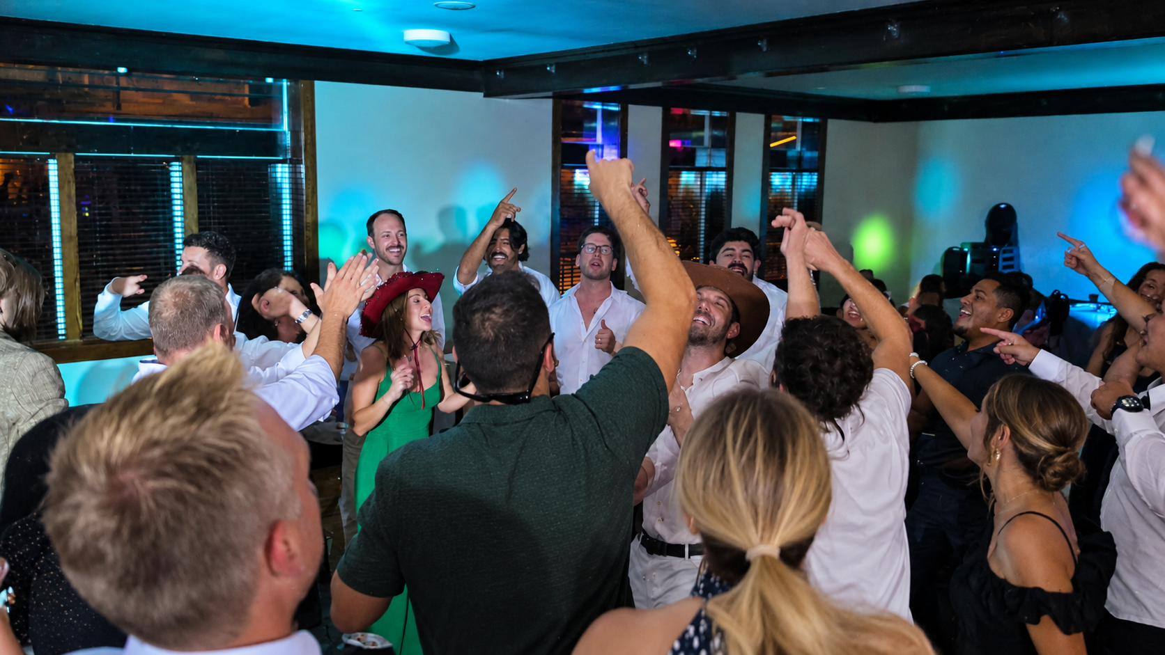 Teal-Lit Crowd Dance Party.png