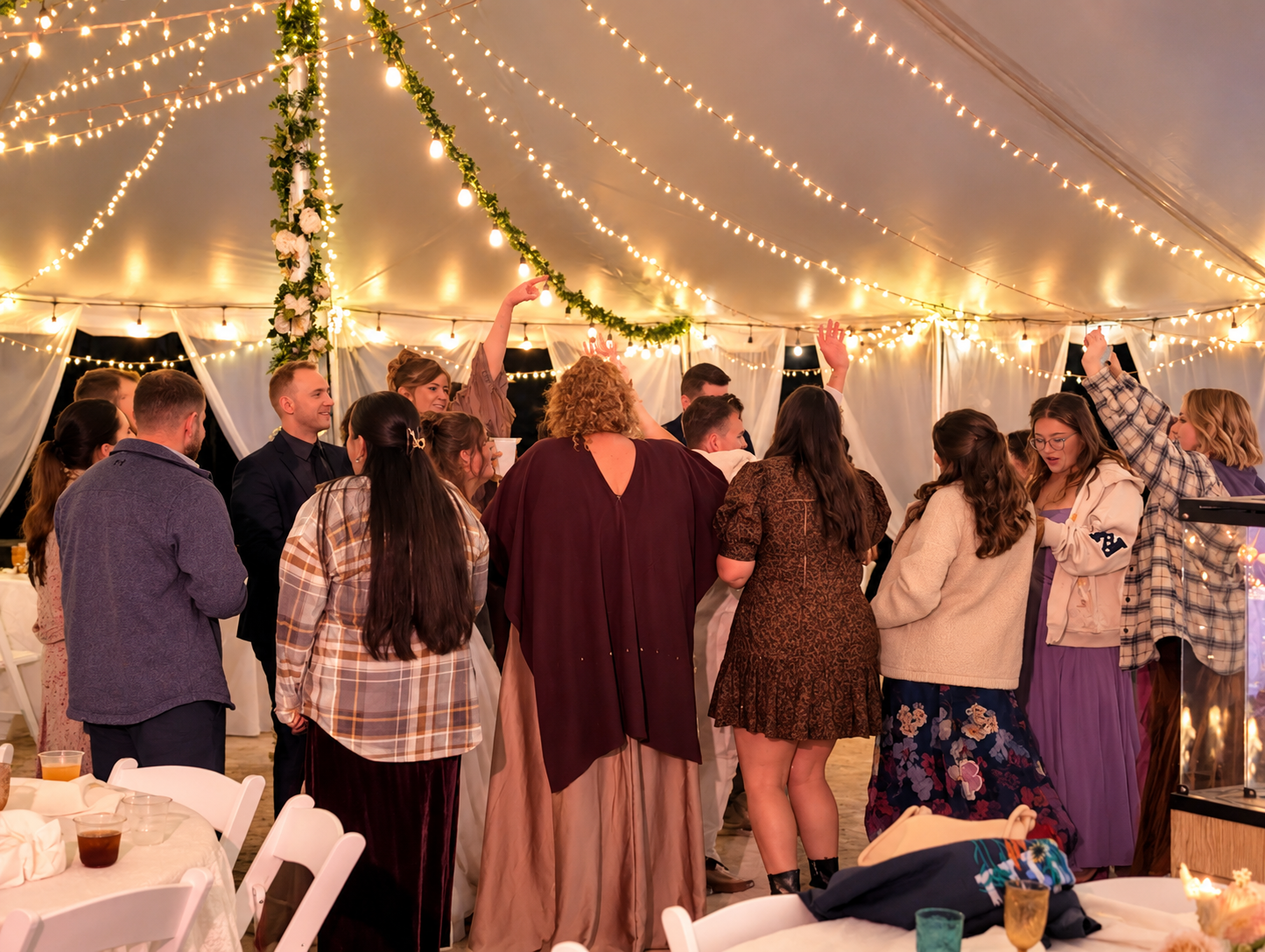 Lively Wedding Dance Floor Under String Lights.png