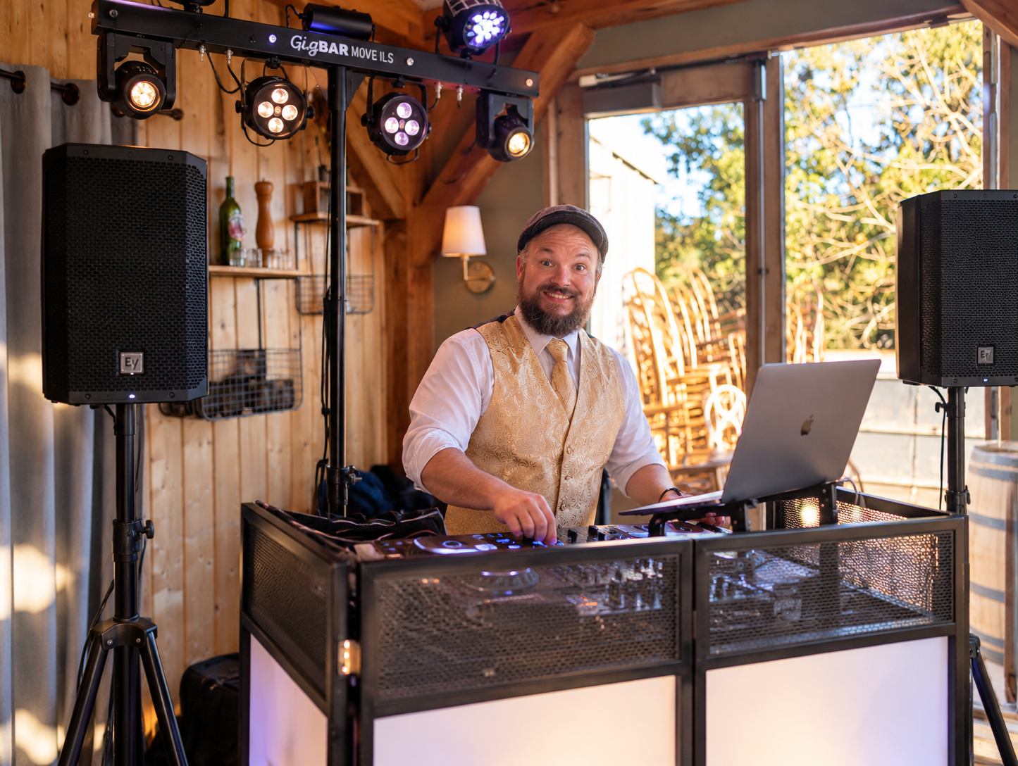 Smiling DJ at Rustic Wedding Reception.png