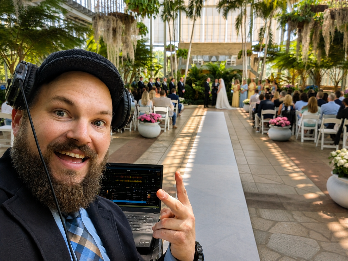 Outdoor wedding ceremony with palm trees and elegant aisle setup as DJ Jazzy Josh provides ceremony music and sound support