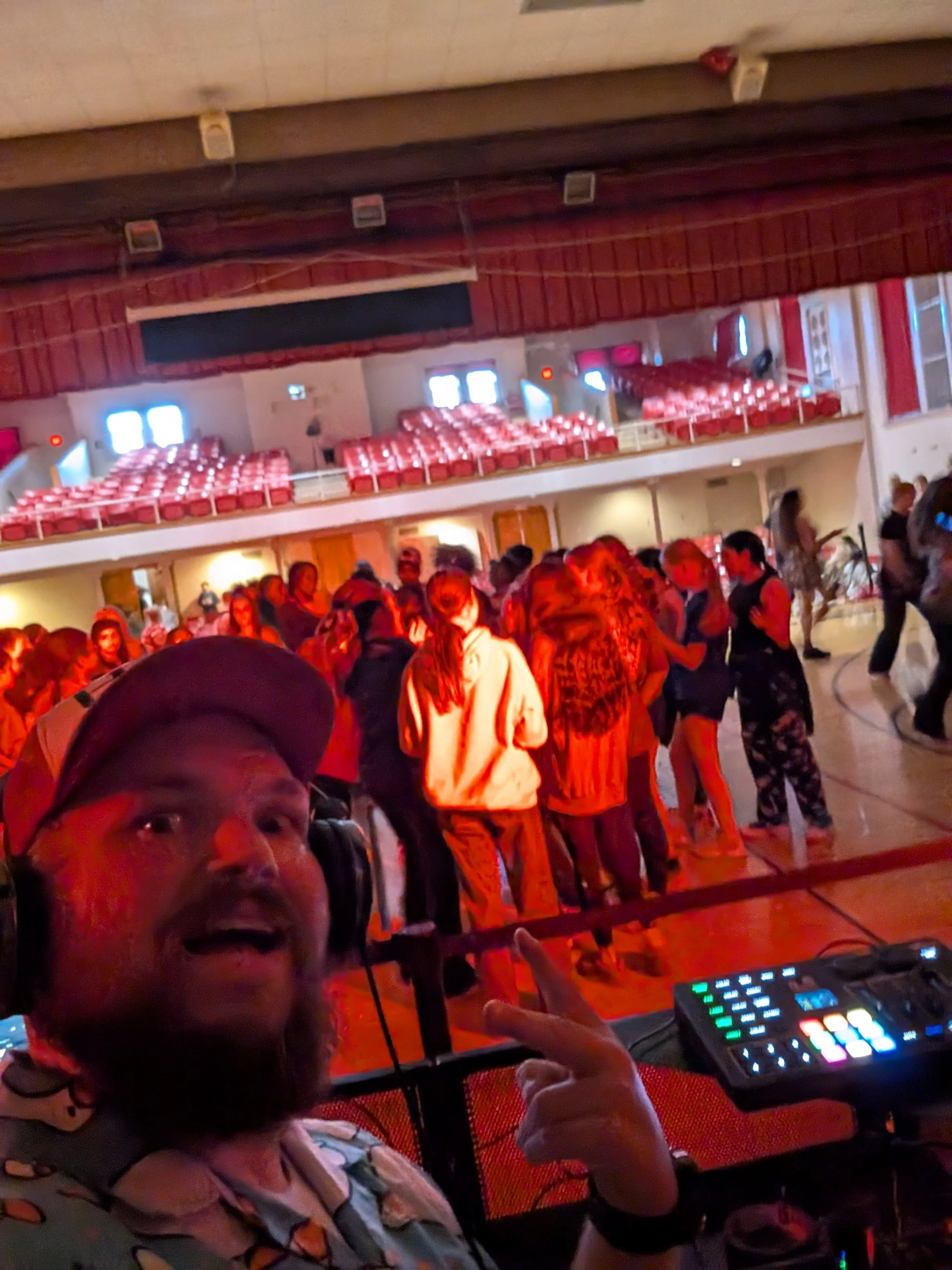 DJ Jazzy Josh running the sound and bringing the energy for a middle school party