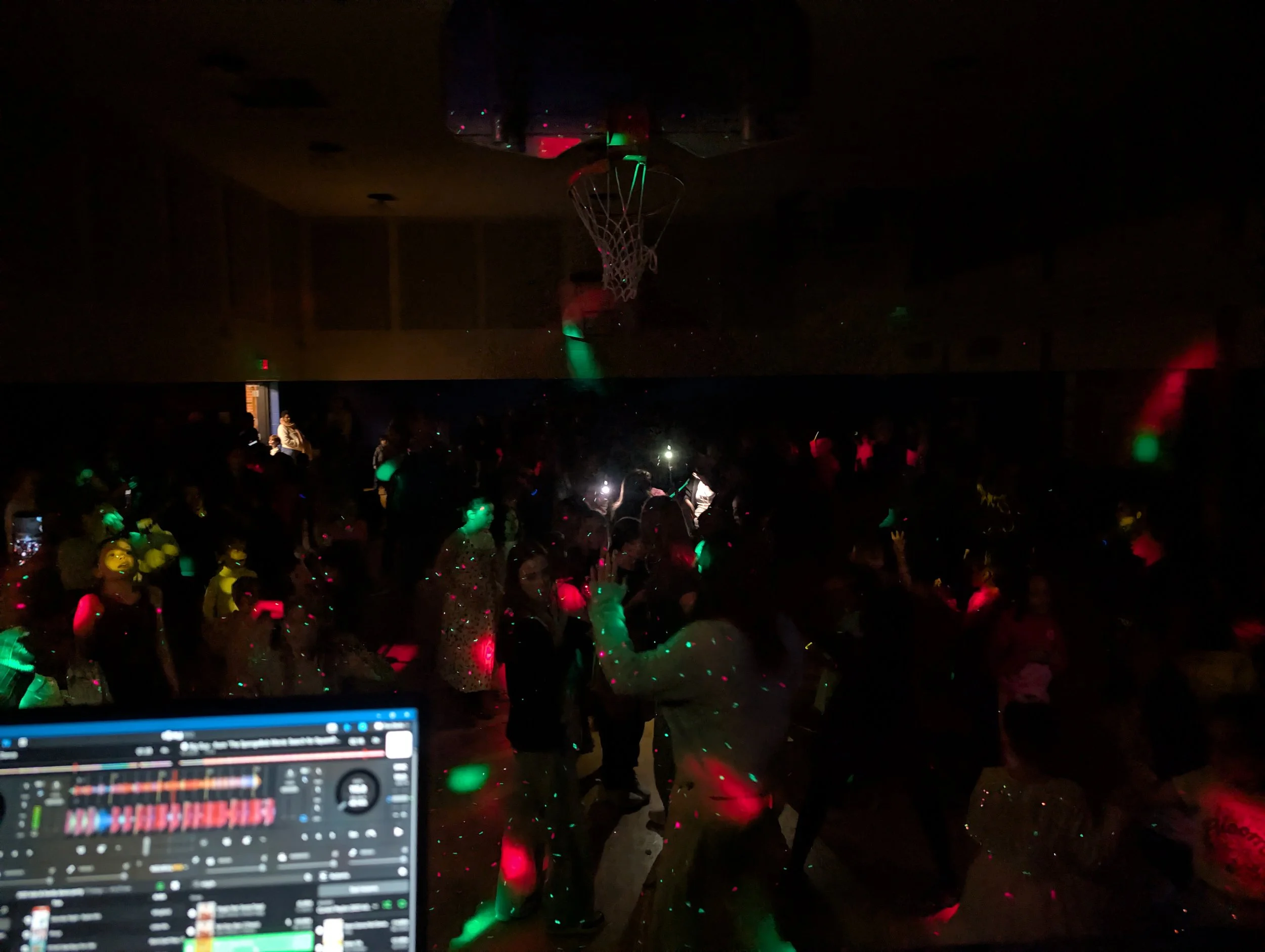 Jazzy Josh bringing the energy to a school dance floor with lights and effects