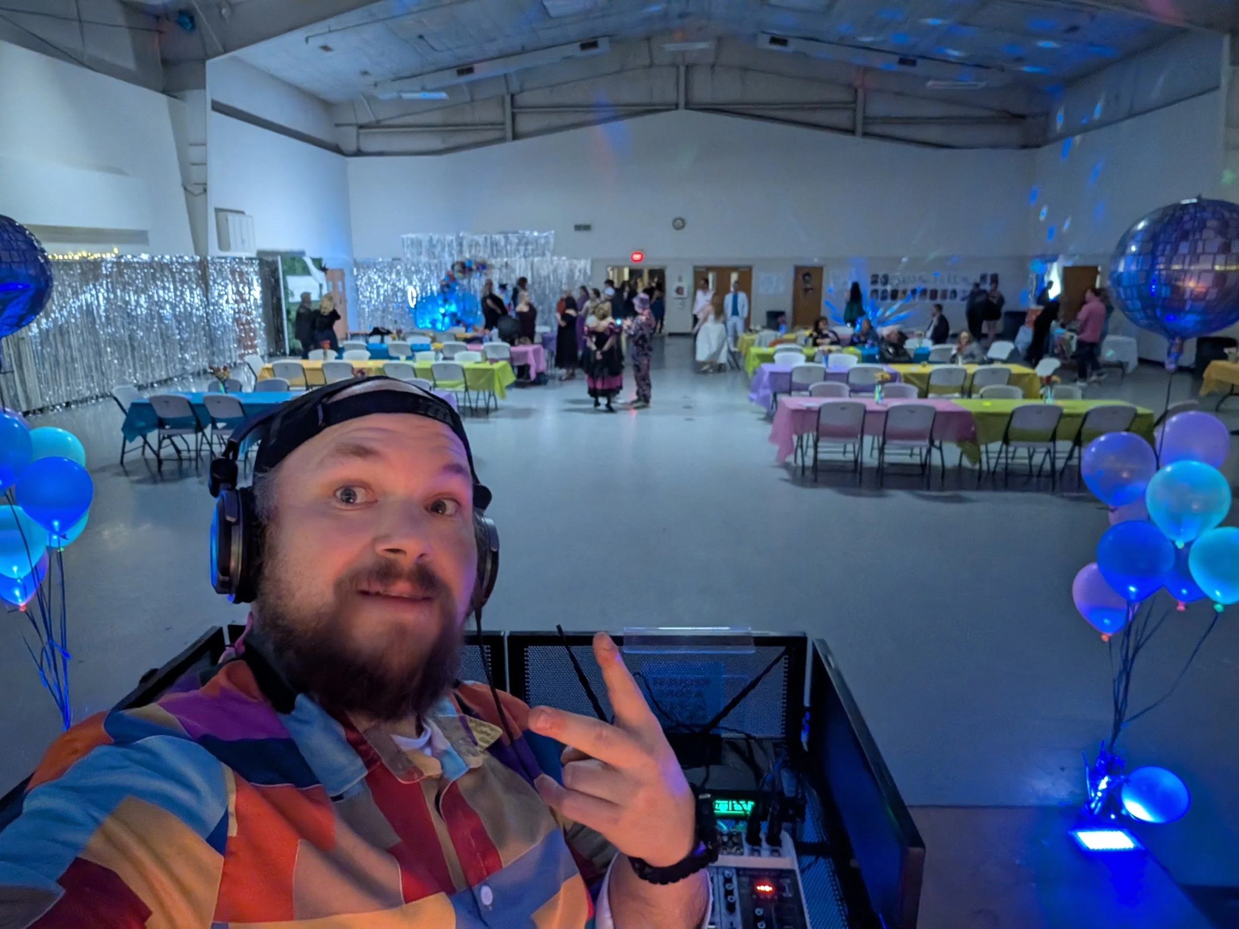 DJ Jazzy Josh running the sound and keeping the energy for a corporate Christmas party