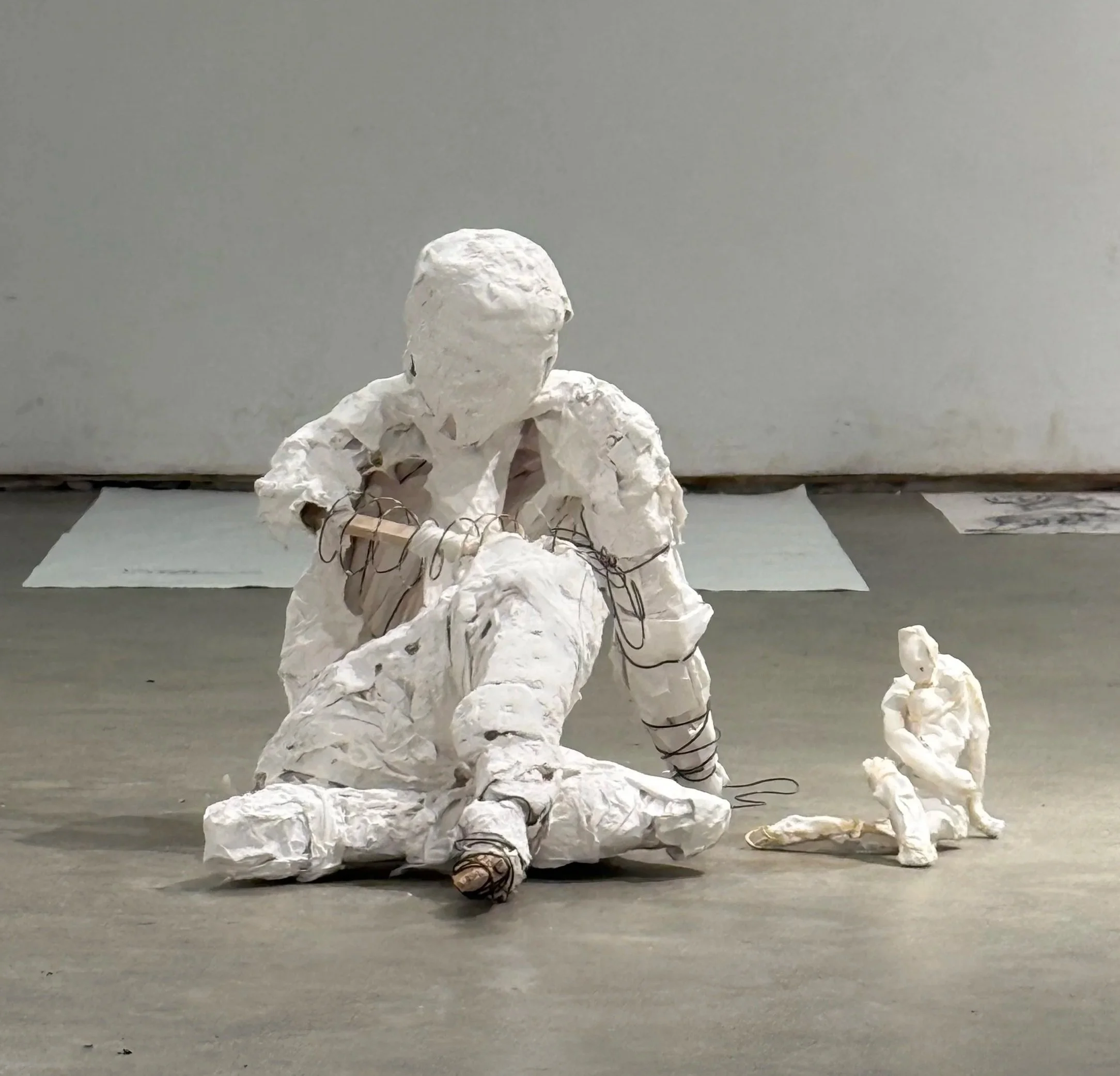 Seated Figure Sculpture