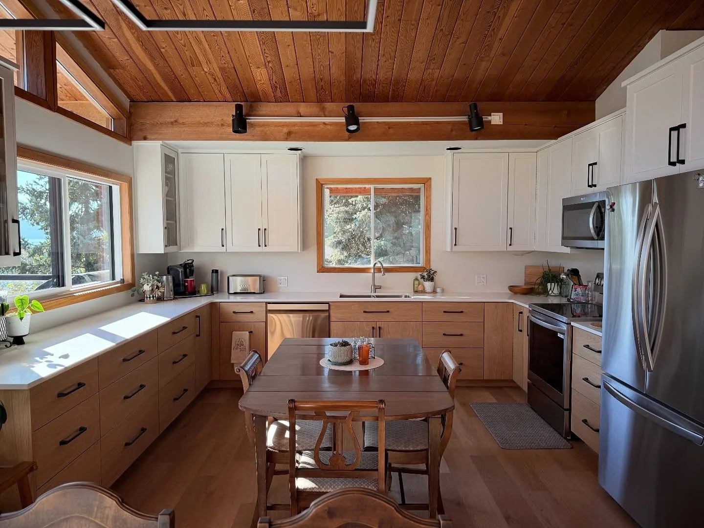 Transforming this space meant removing walls, adding windows, and completely reimagining how the kitchen flows. Renovations like this can seem daunting, but the results speak for themselves &mdash; bright, open, and built to last. #KitchenRenovation 