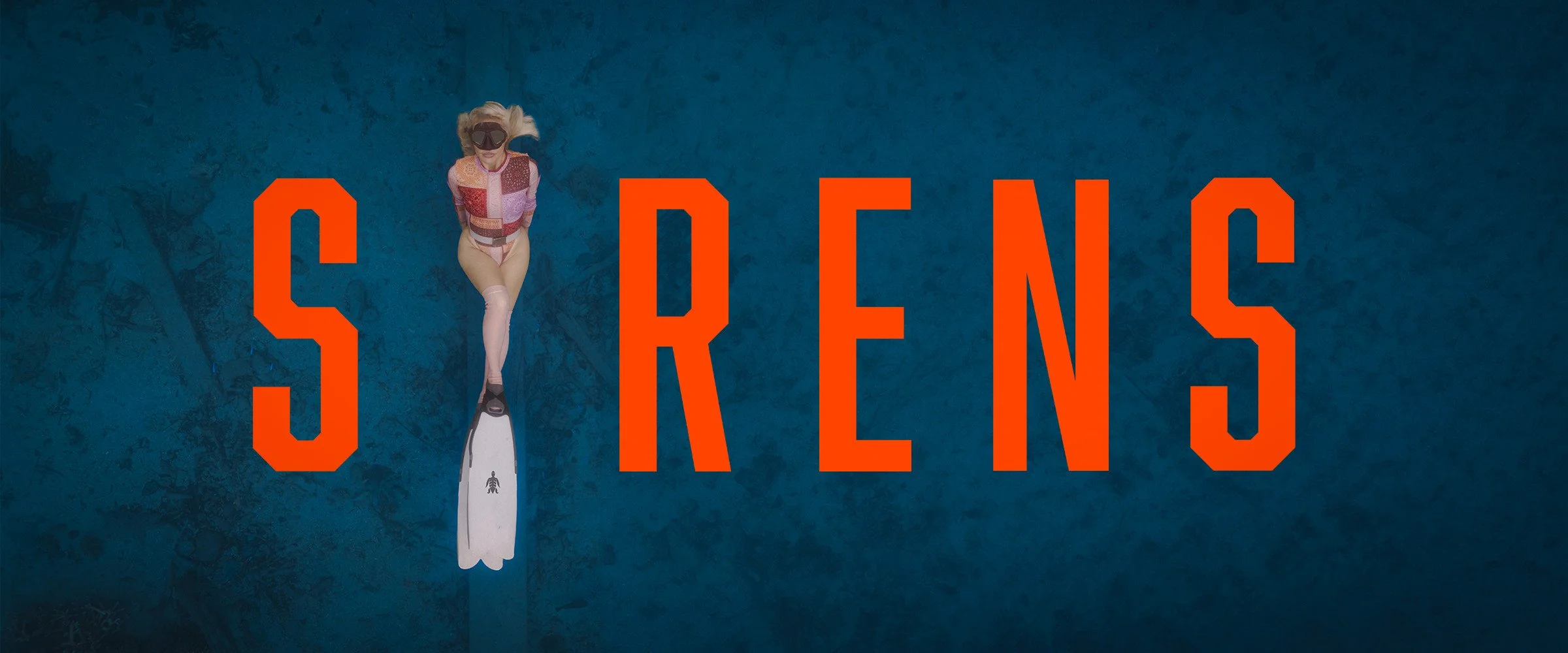 Sirens Dive Masks — orange SIRENS lettering and a freediver above a blue reef.