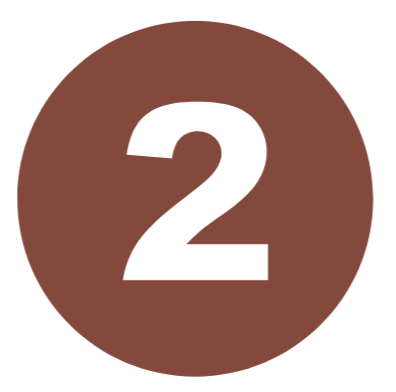 Brown circular sign with the number 2 in black