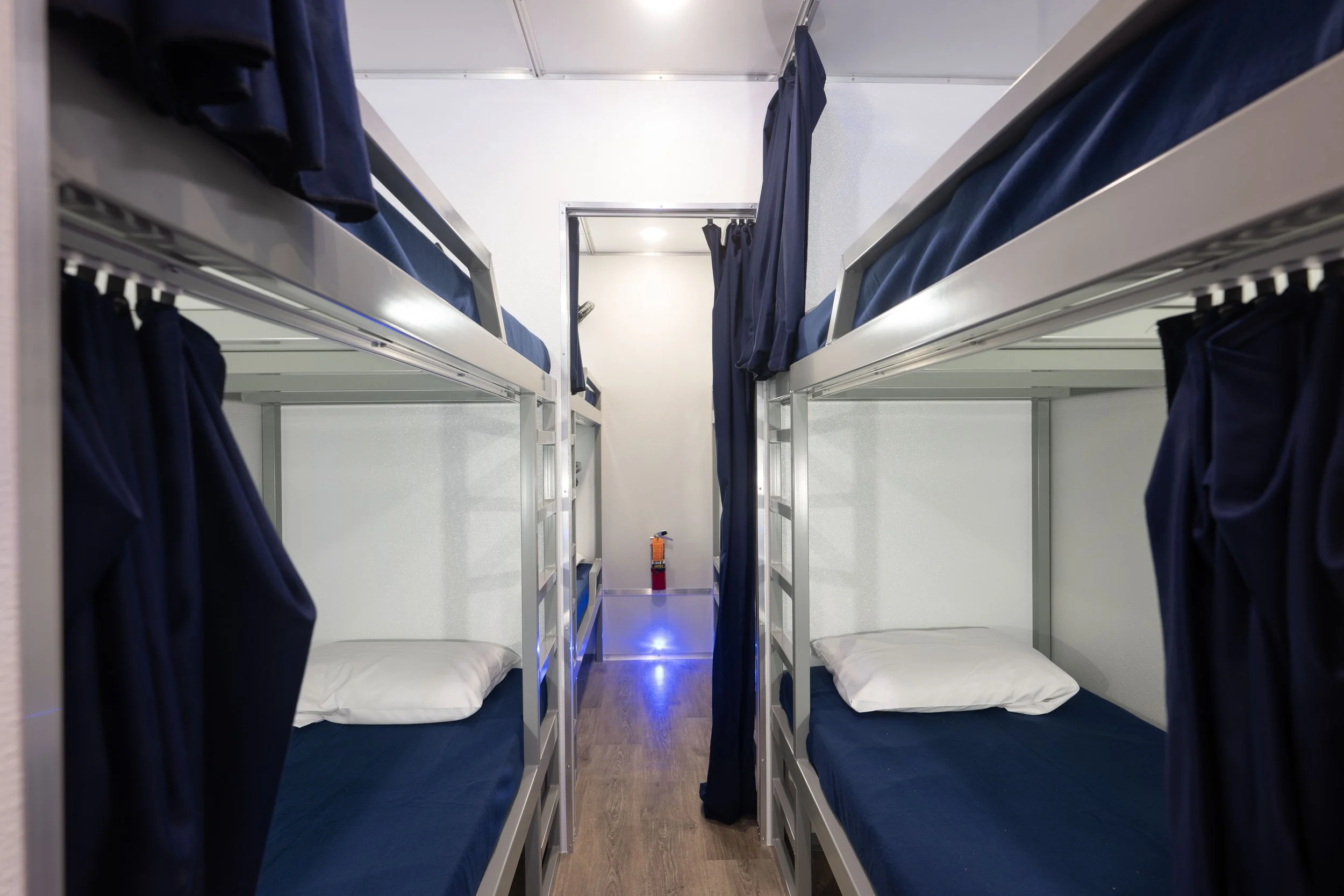 interior of a bunk sleeper trailer being use at a temporary housing solutions facility 