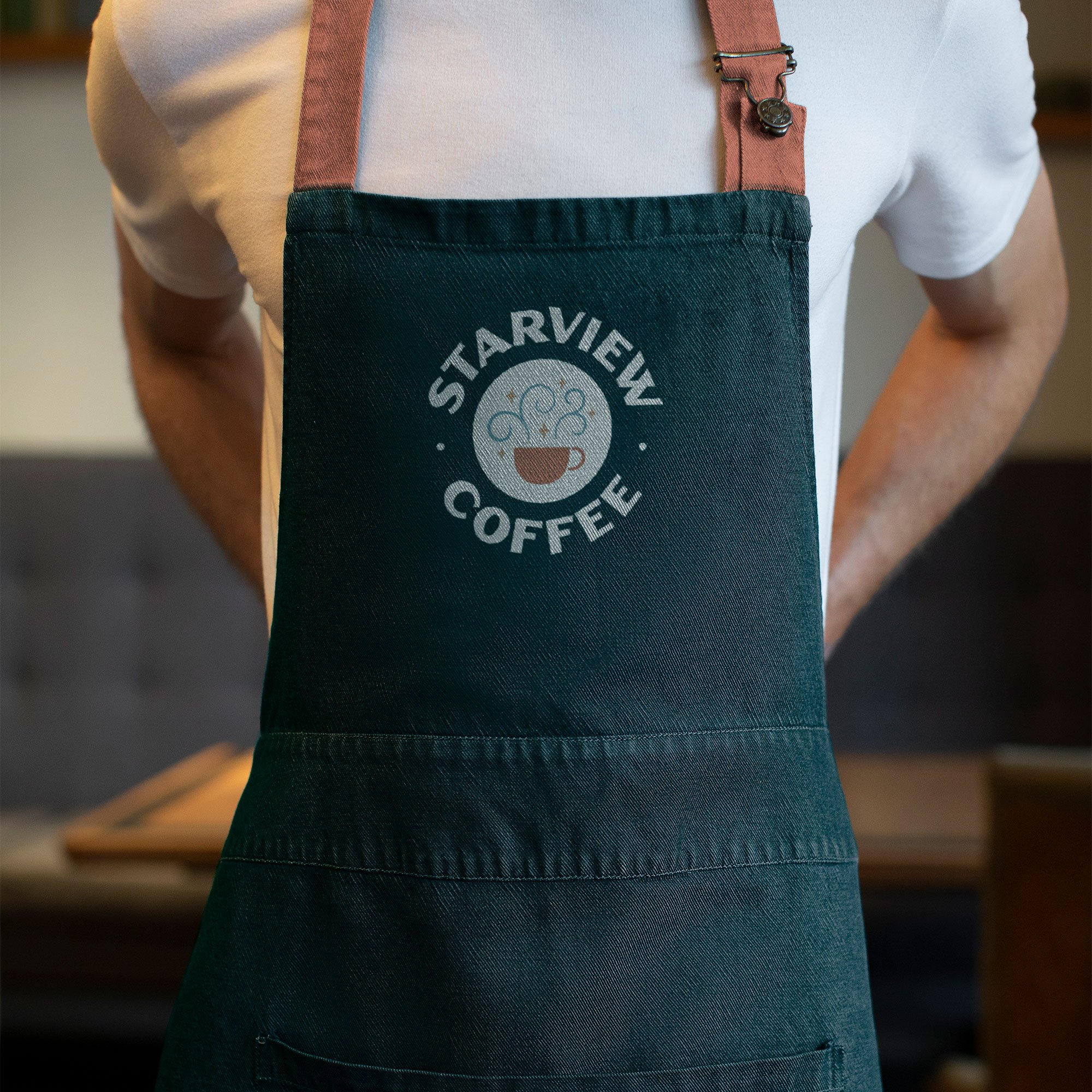 Retro logo for Starview Coffee embroidered on an apron