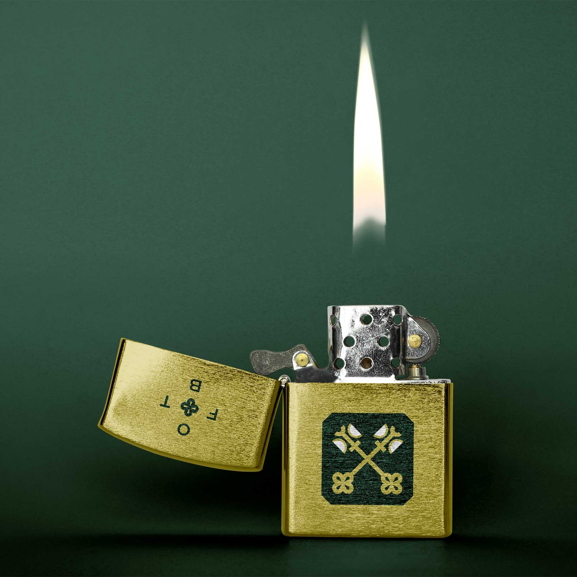 Logo design for One for the Books marketing agency on a gold lighter