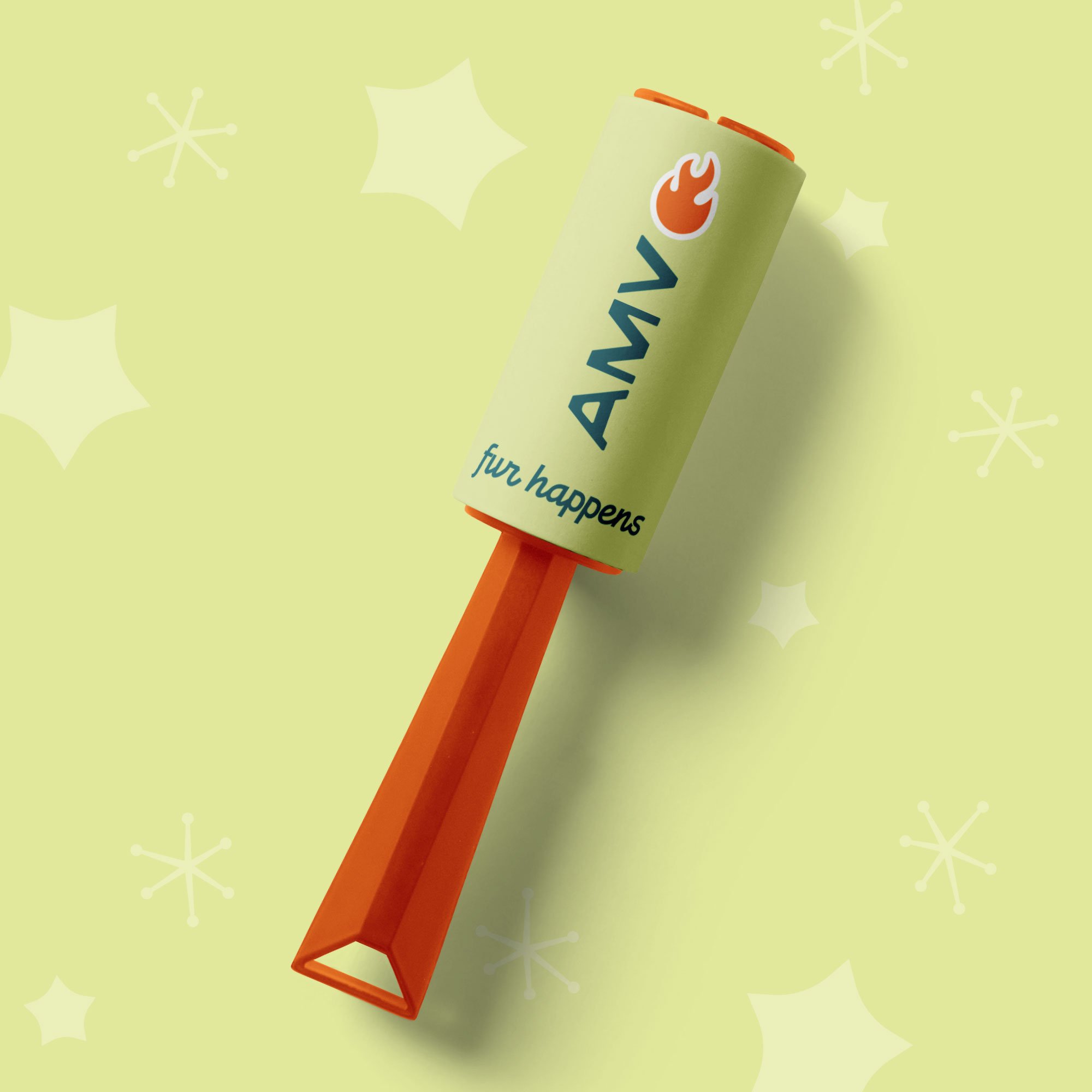 Green lint roller with an orange handle with the Asheville Mobile Vet logo on it and "fur happens" written on it