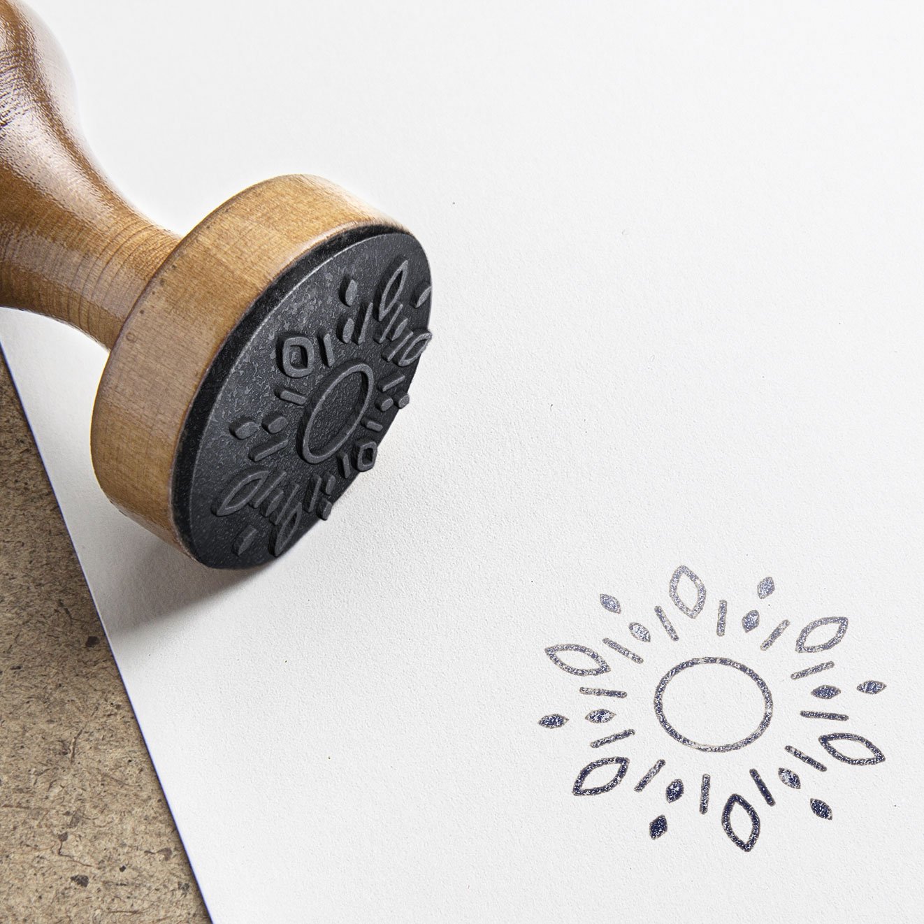 Skyland Palliative Medicine icon on a rubber stamp, and stamped in black on a paper