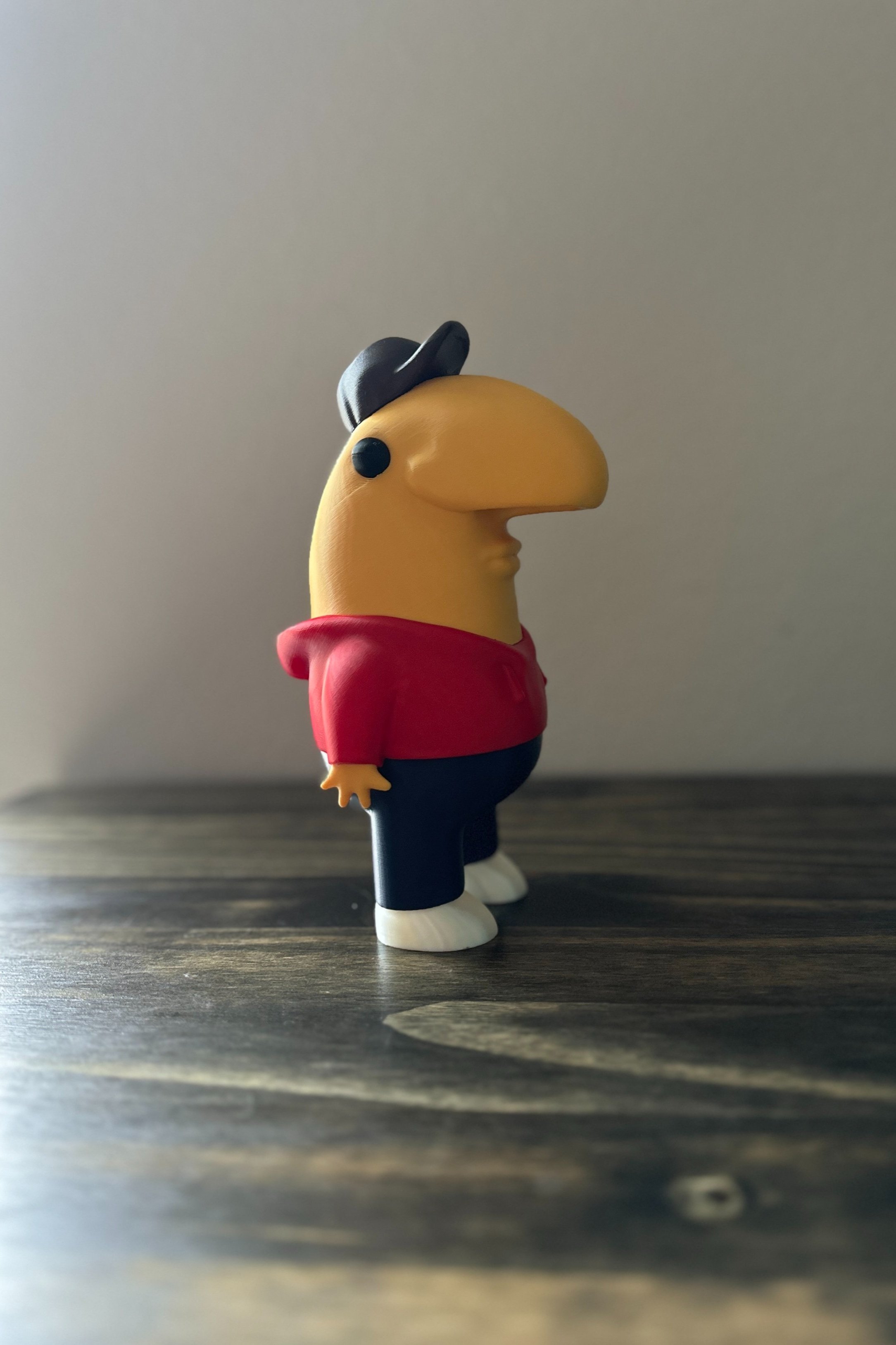 3D printed Charlie Dompler figure. Smiling friends character figure. Stands 7.64 inches tall