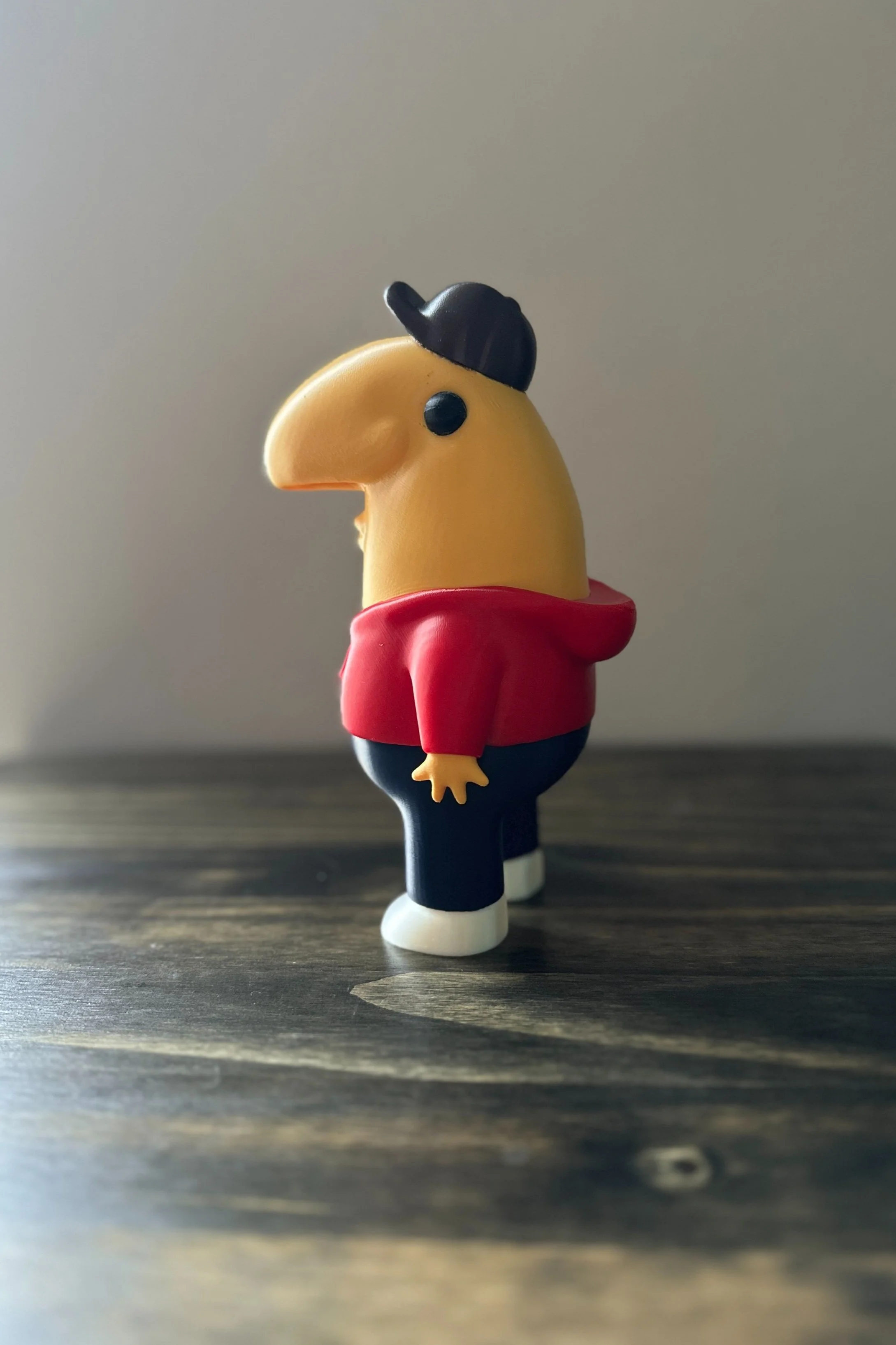 3D printed Charlie Dompler figure. Smiling friends character figure. Stands 7.64 inches tall