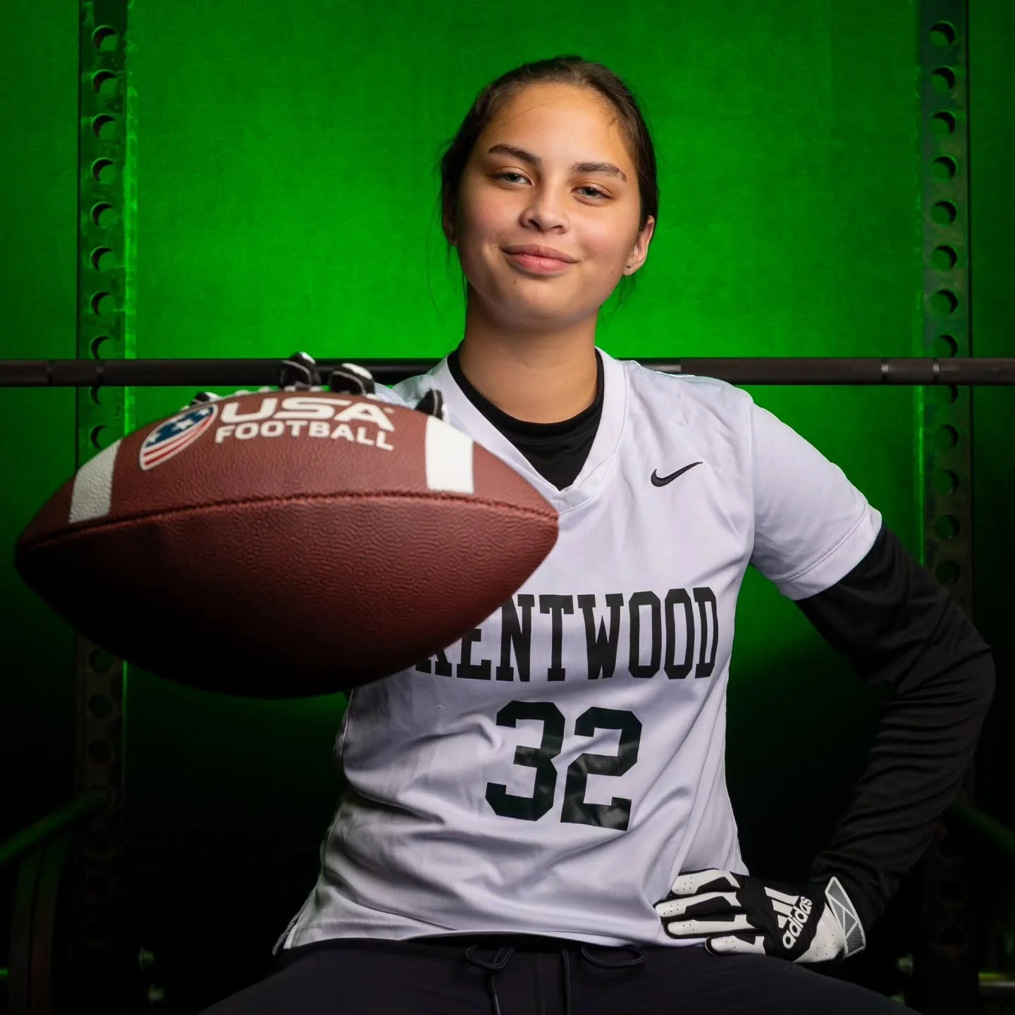 I had to include my dad's, her eponym, high school first string all-star photo. Her smile tells you how much she loves football.