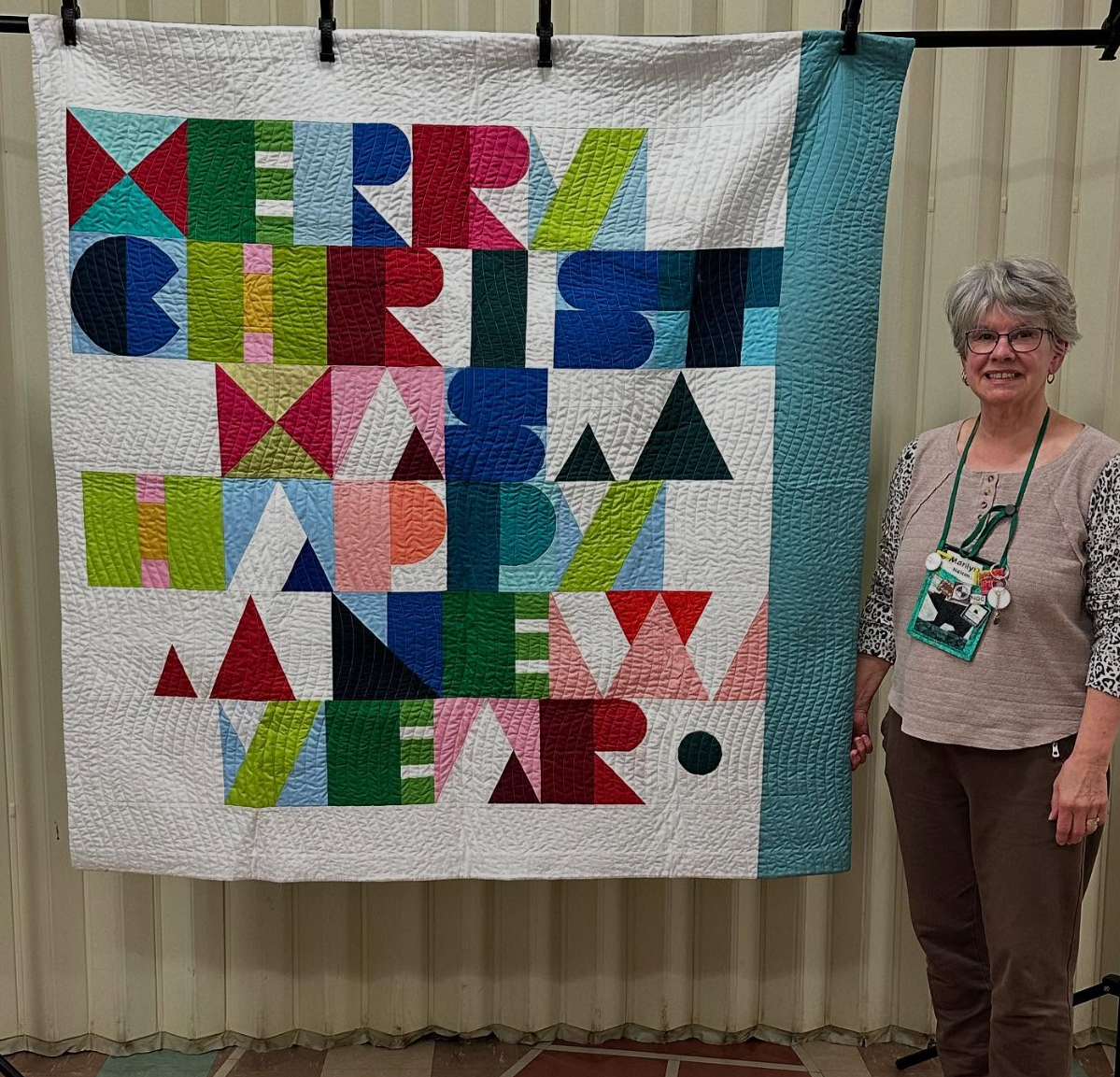 Marilyn with her Christmas Quilt.