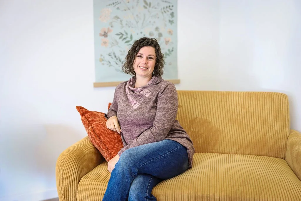 A headshot of Certified Professional Midwife, Grace Welliver, in her midwifery office in Athens, TN