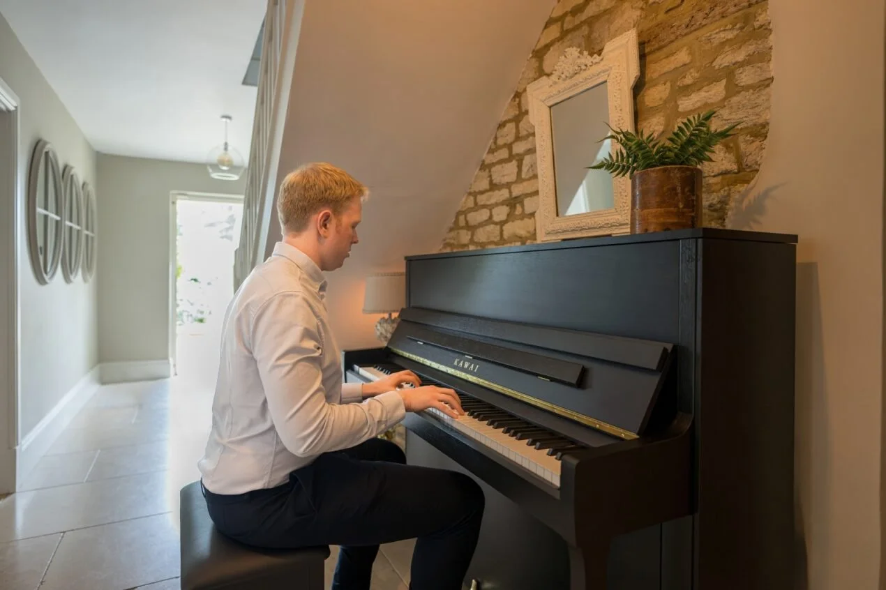 Student playing piano