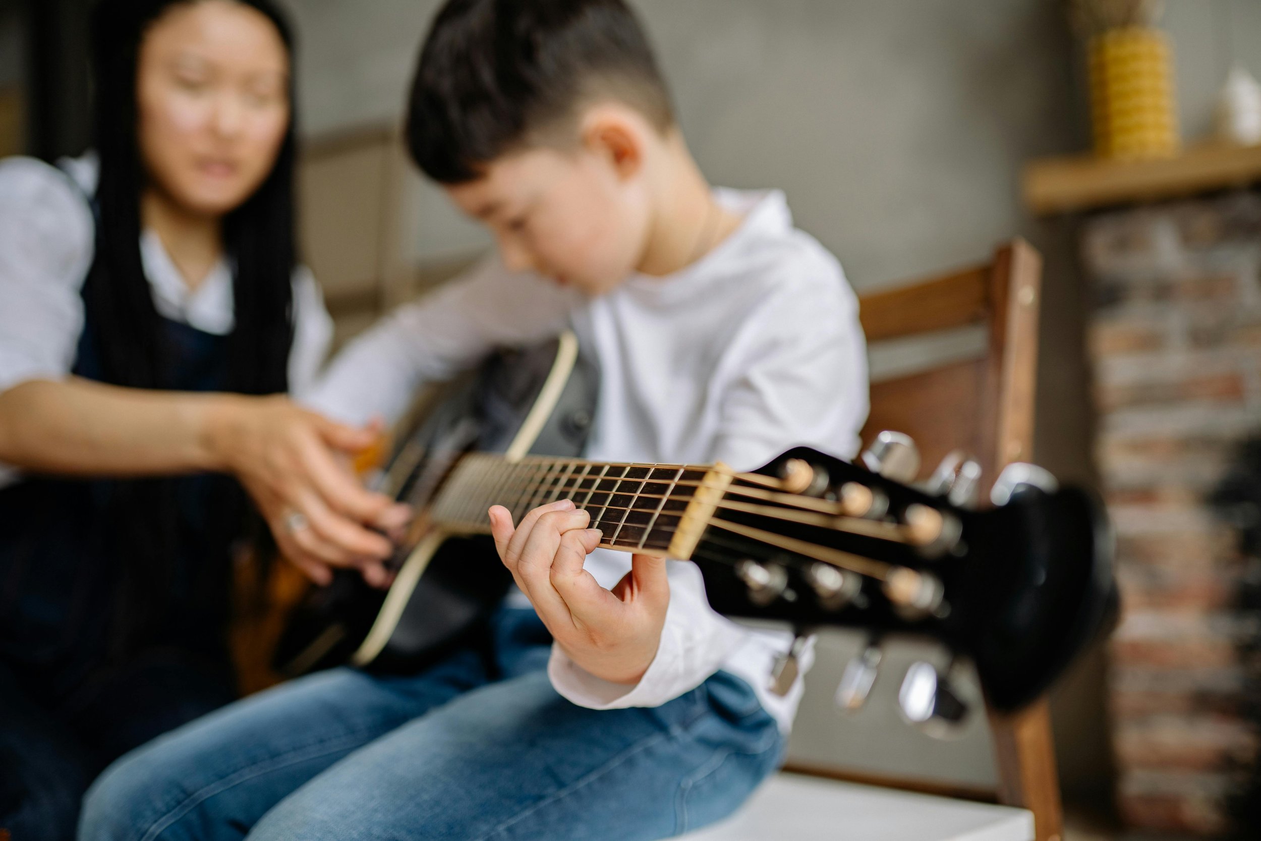 Student learning guitar