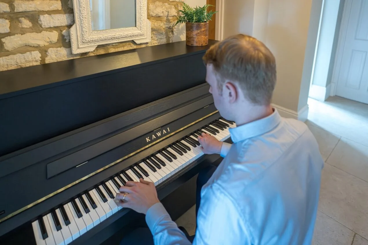 Student playing piano