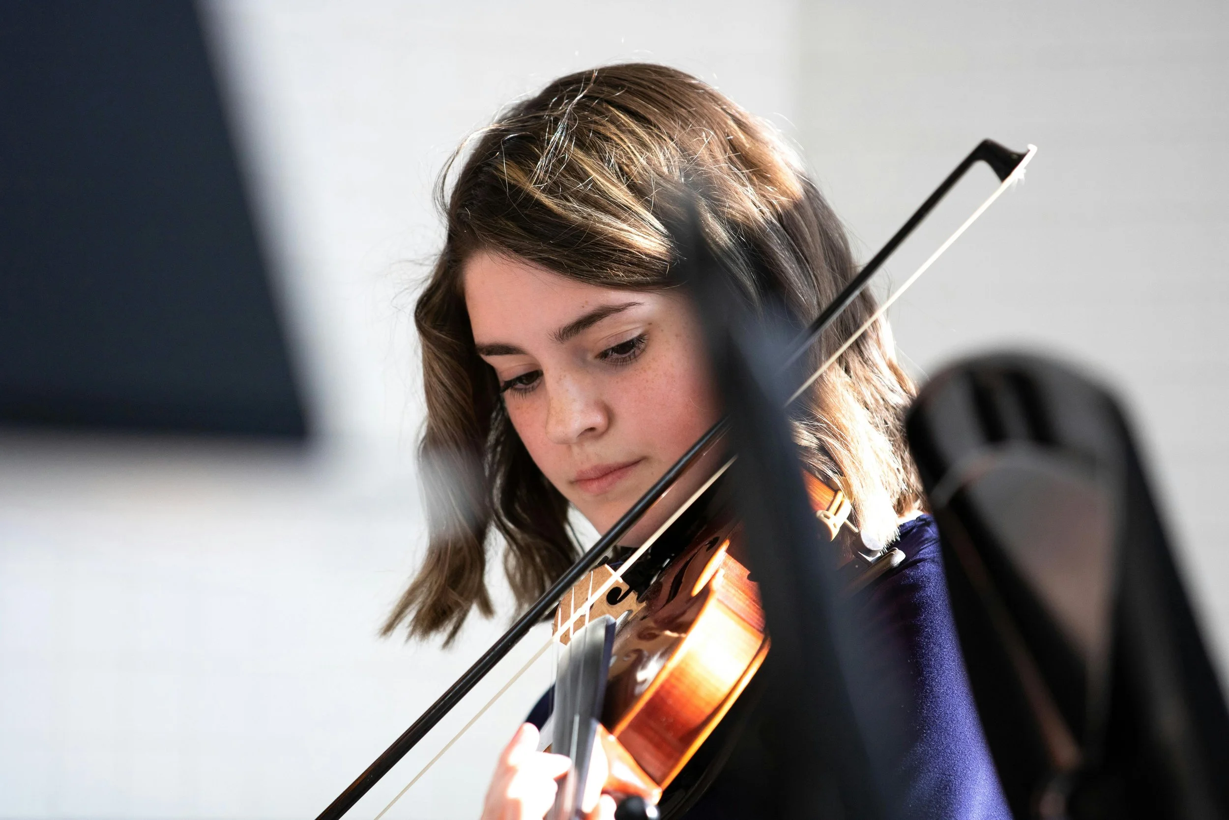 Student playing violin